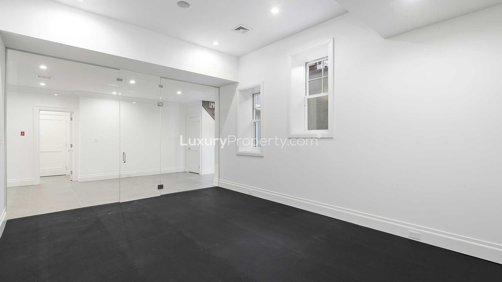 Luxurious living room with fireplace in 7-bedroom villa, North Haven, Sag Harbour