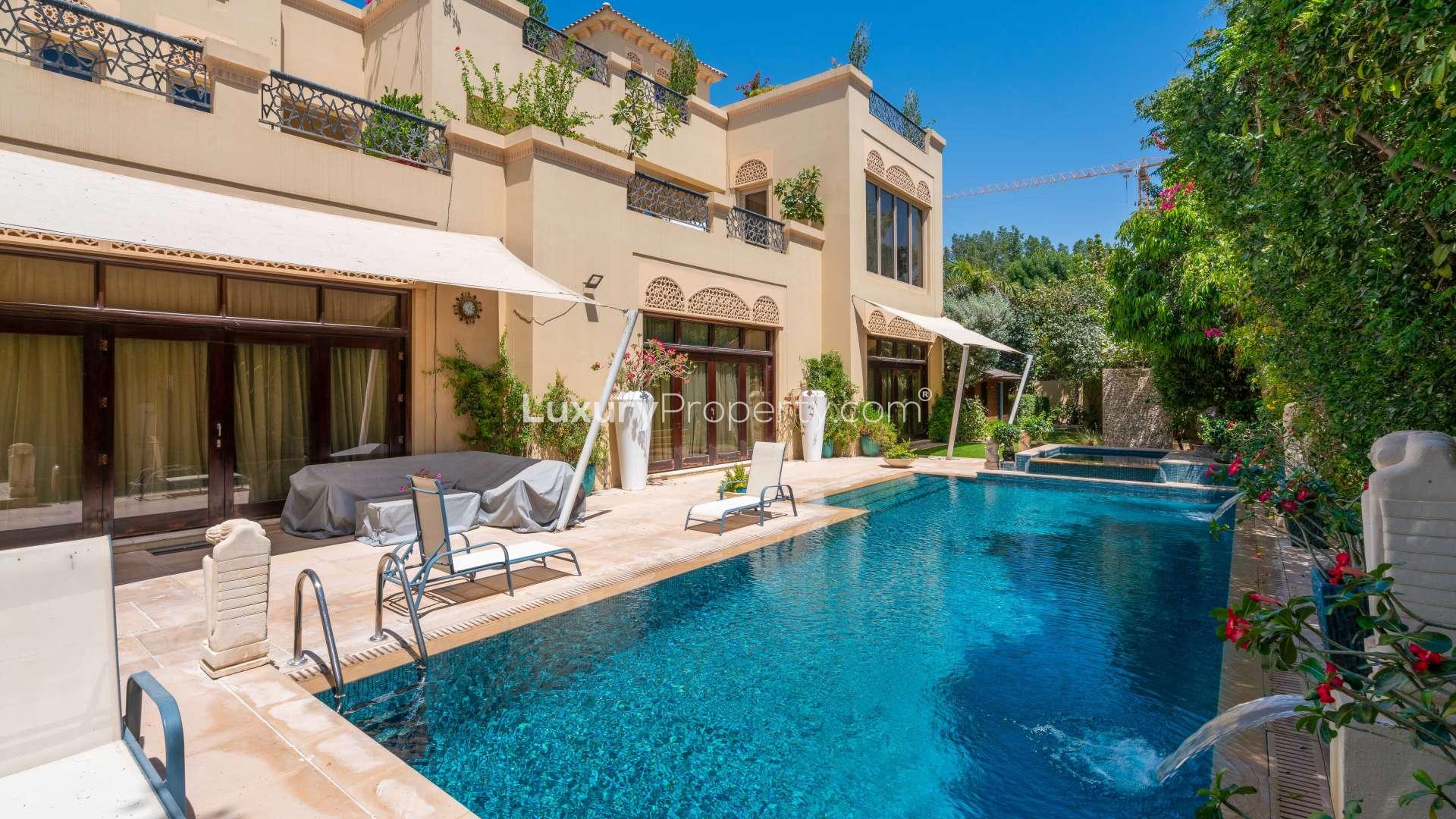 Spacious living room with large windows in Al Barari Acacia Villas, Dubai corner plot villa