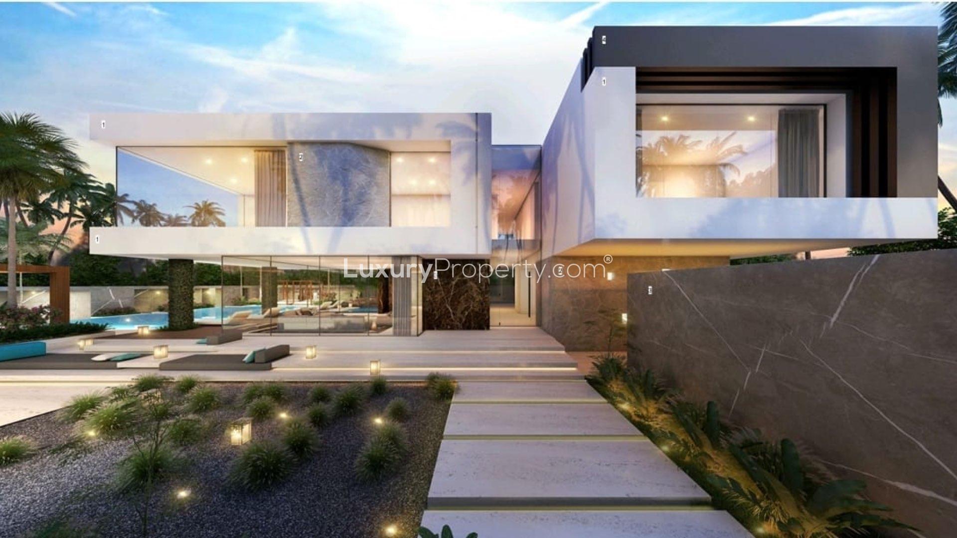 Stunning Al Wasl villa with modern architecture, pool, and lush landscaping for sale