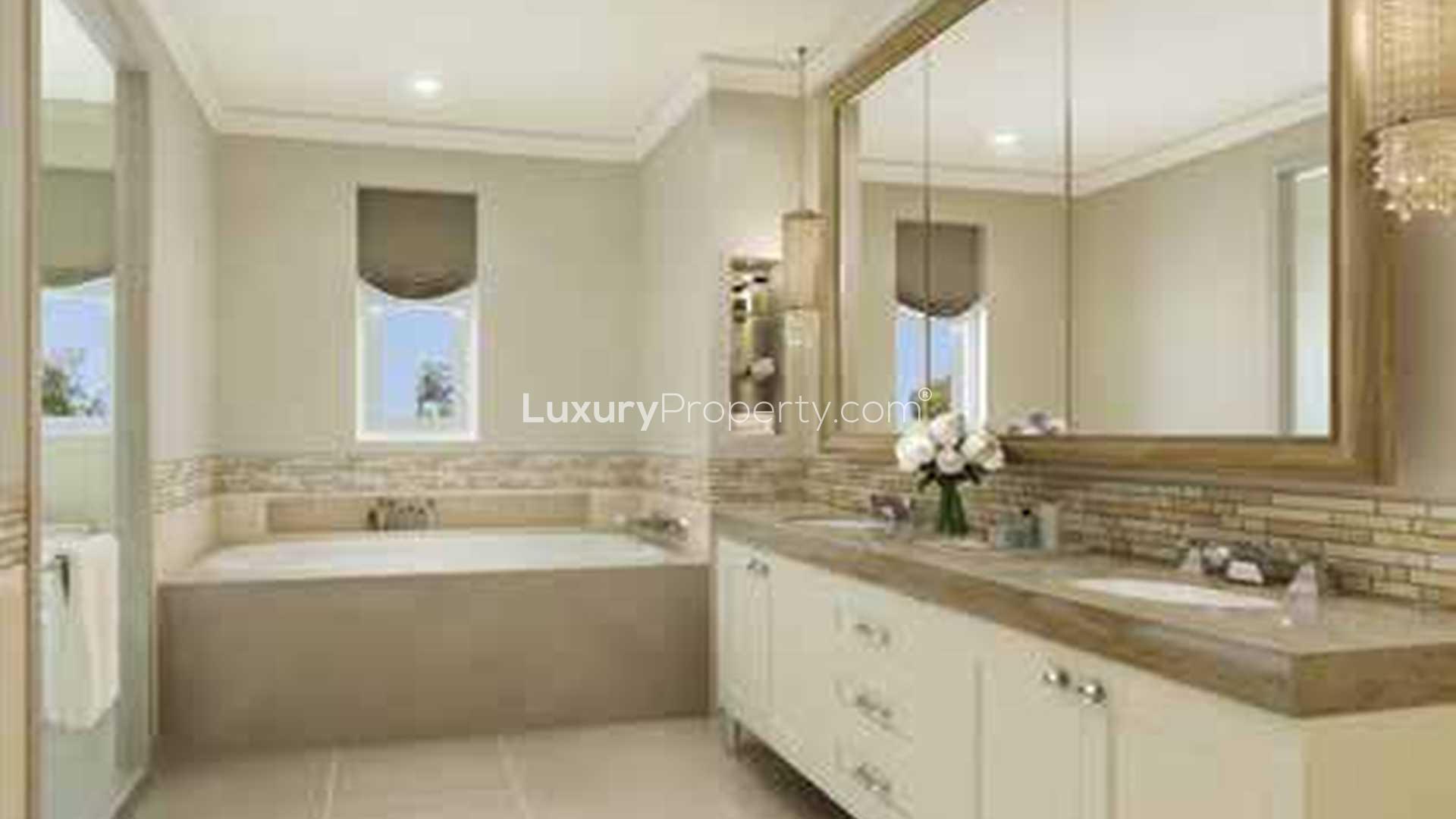 Elegant dining room in spacious Aseel Villa, Arabian Ranches 2, with large table setting