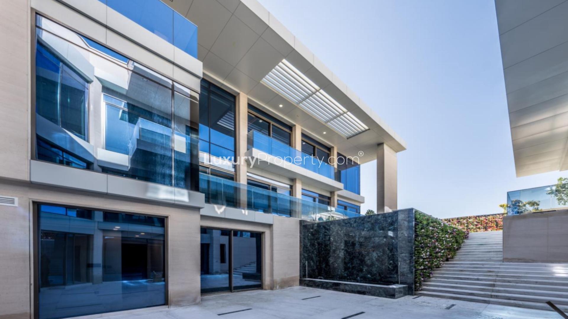 Elegant Pearl Jumeirah villa exterior with modern design, featuring spacious architecture and landscaped entrance