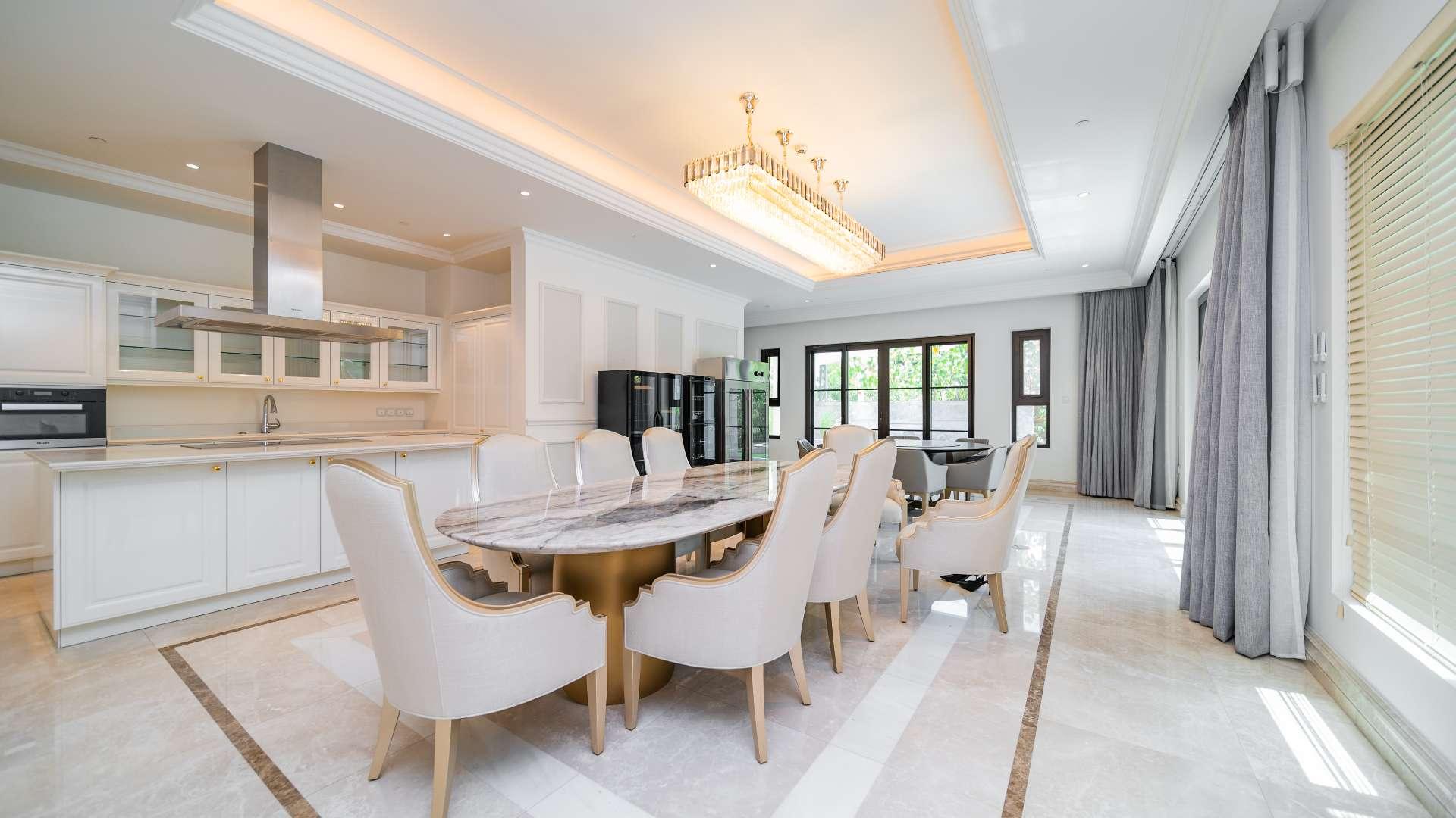 Luxurious kitchen and dining area in Mediterranean mansion, MBR City District One villa