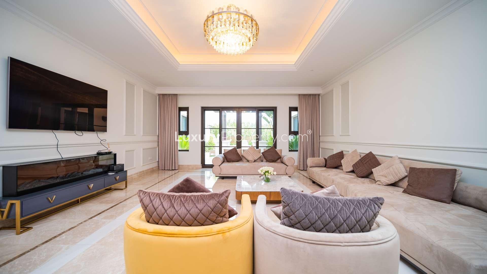 Luxurious Mediterranean villa exterior in District One, MBR City, featuring lush landscaping