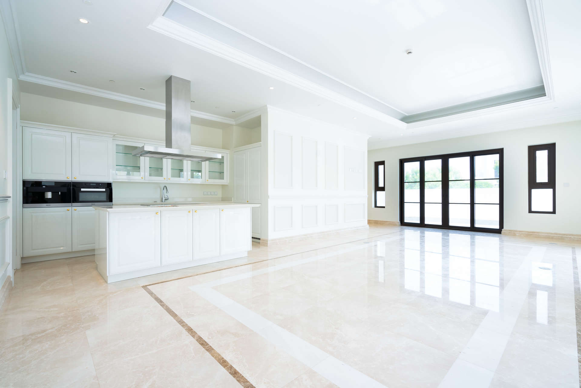 Spacious kitchen in elegant Mediterranean villa, District One, with modern design and ample natural light