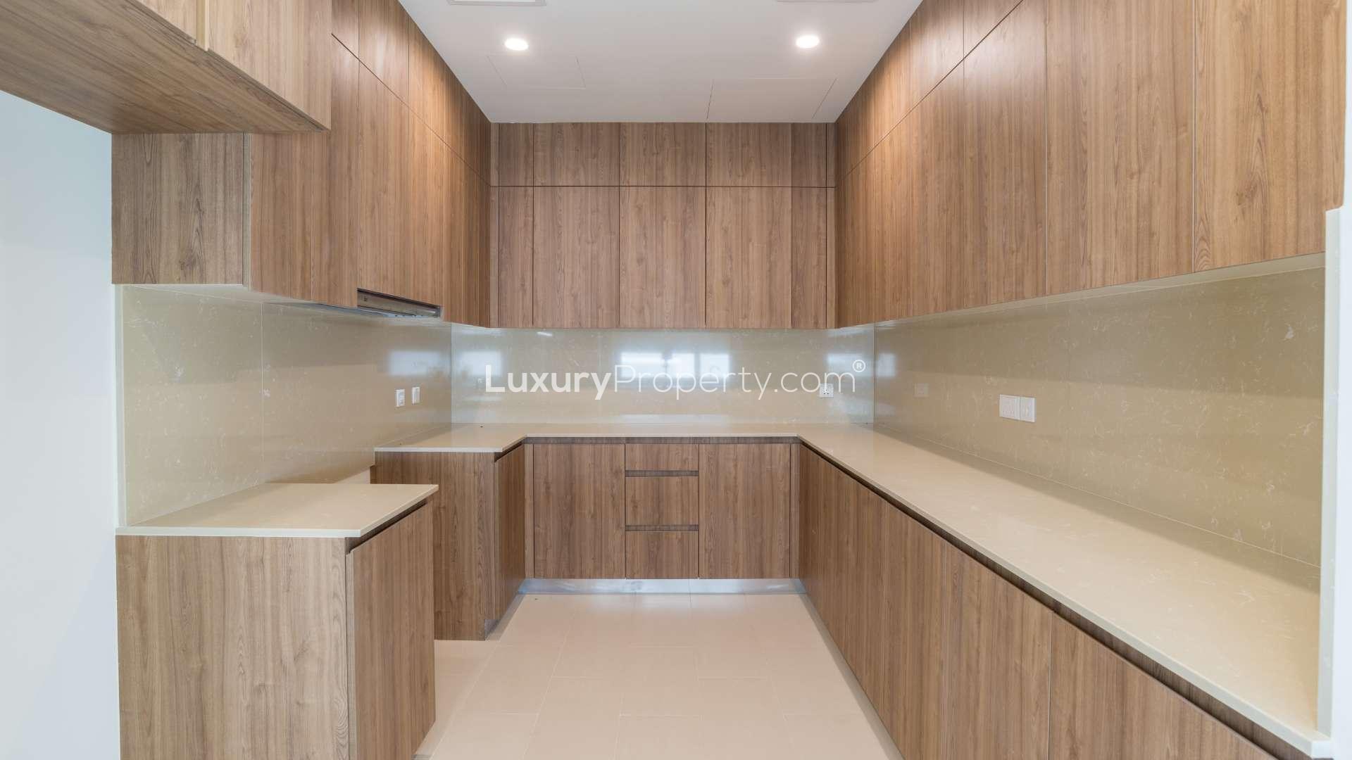 Interior of spacious villa in Dubai Hills Estate, featuring modern design and glass accents