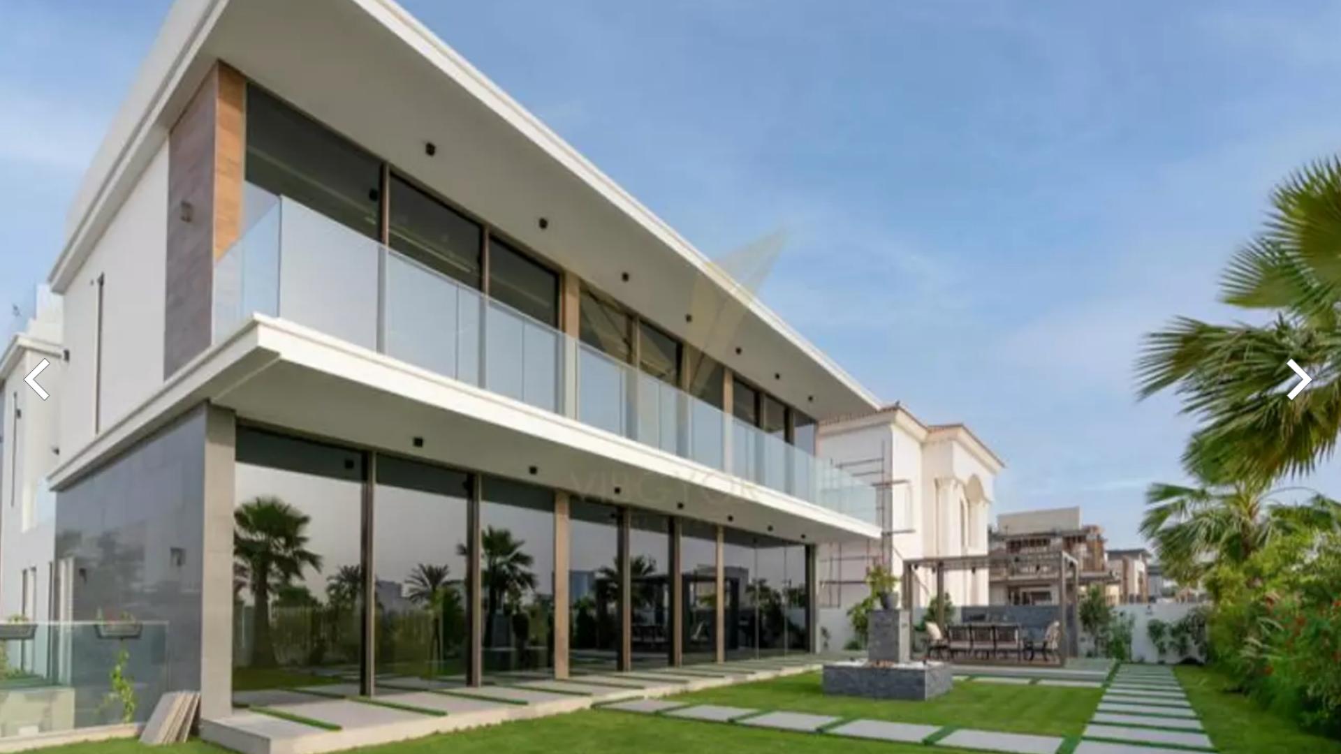 Luxury 7-bedroom villa exterior at dusk, Dubai Hills Estate, Dubai, for sale