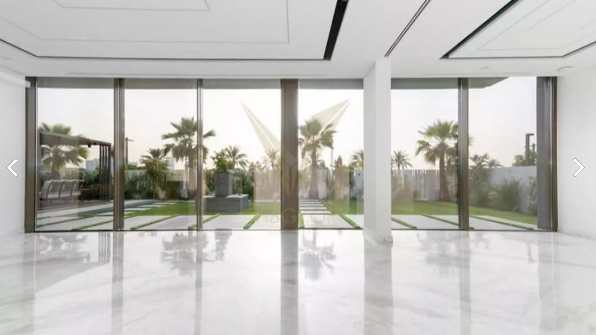 Brand new 7-bedroom luxury villa exterior in Dubai Hills Estate with landscaped garden