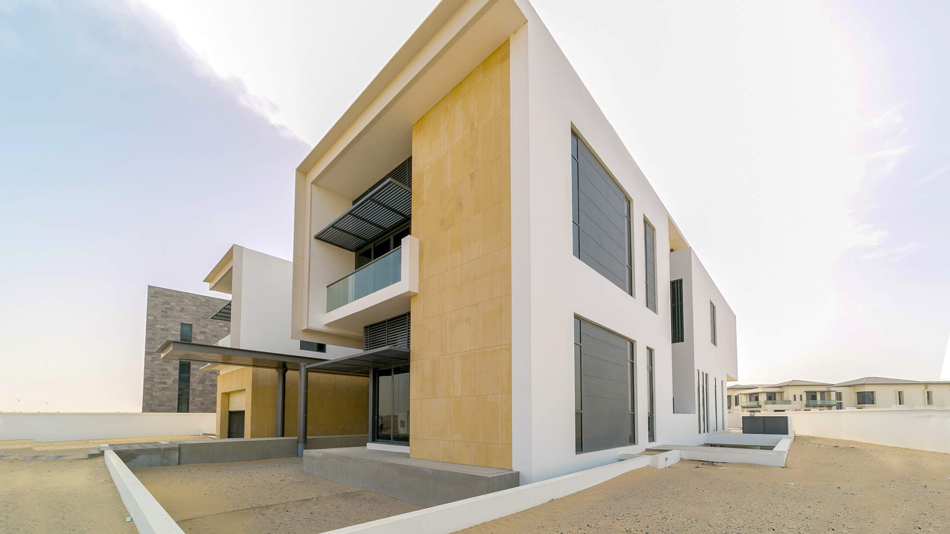 Modern villa exterior in Dubai Hills Estate, featuring sleek architecture and spacious design