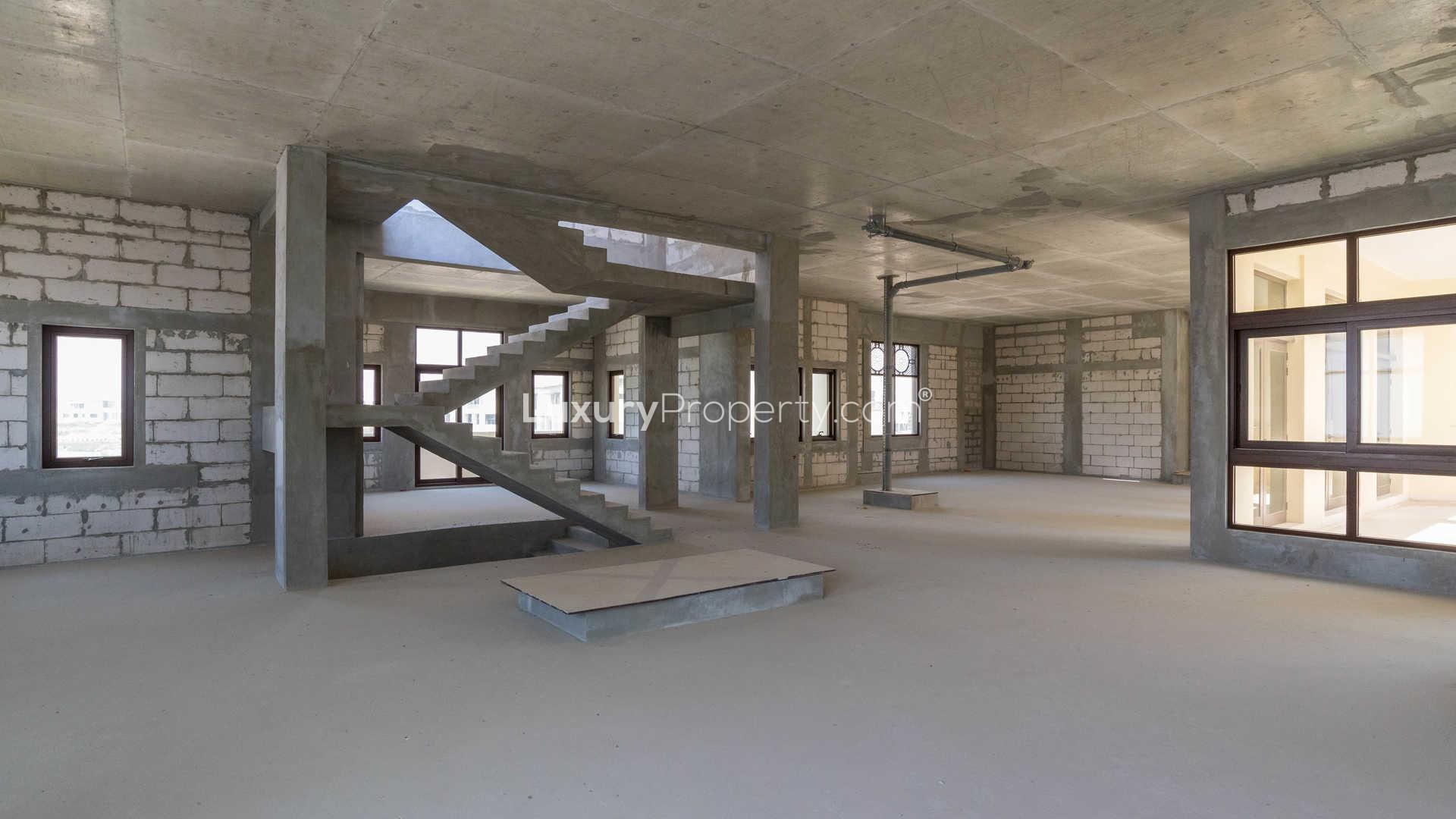 Courtyard of classic 7-bedroom villa in Dubai Hills Estate, featuring spacious layout and windows