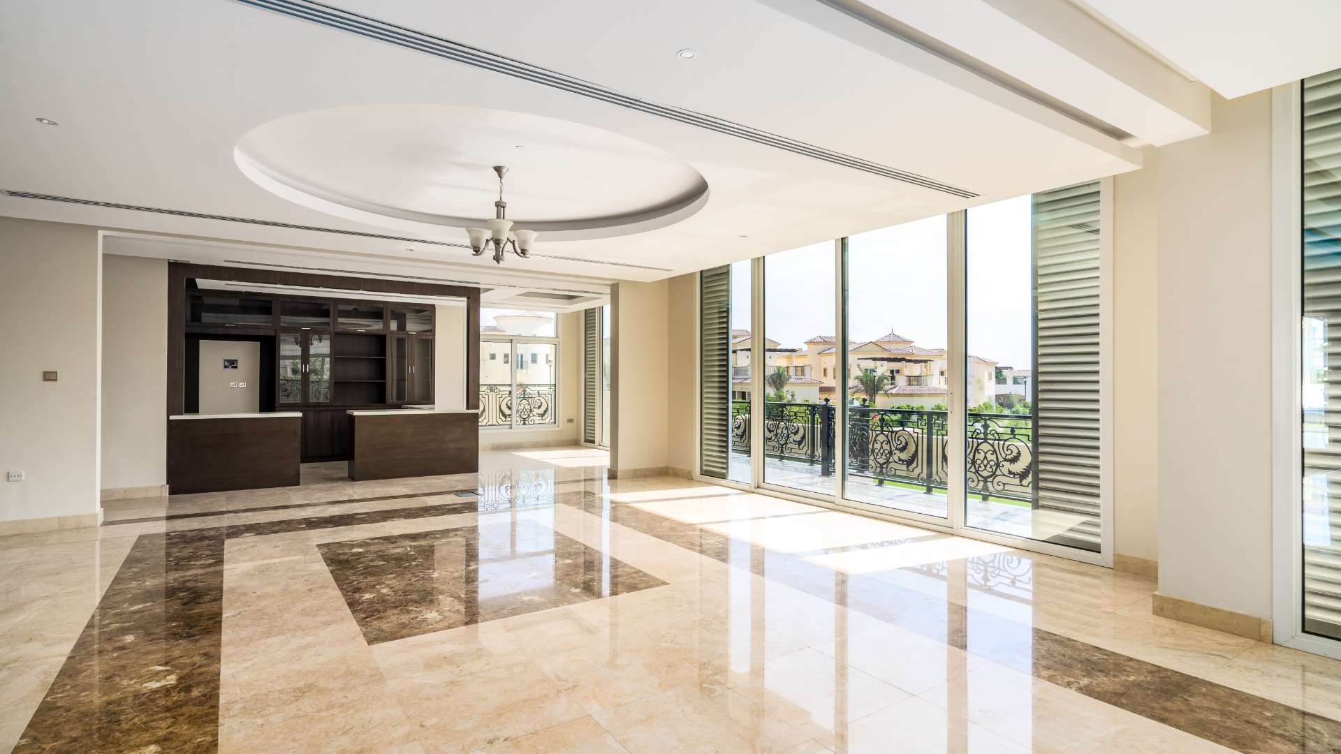 Spacious living area with marble floors in Jumeirah Golf Estates villa for rent