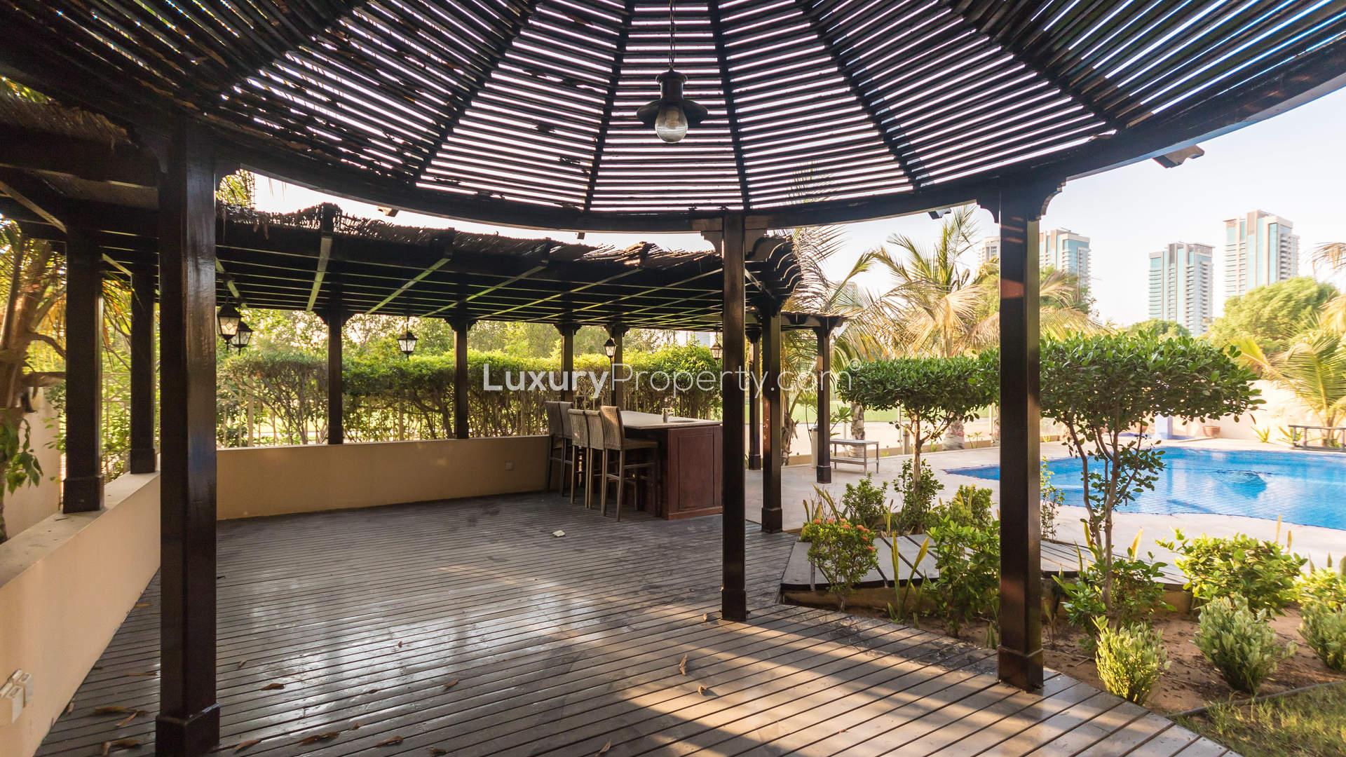 Exterior view of 7-bedroom Hattan Villa for sale in The Lakes community