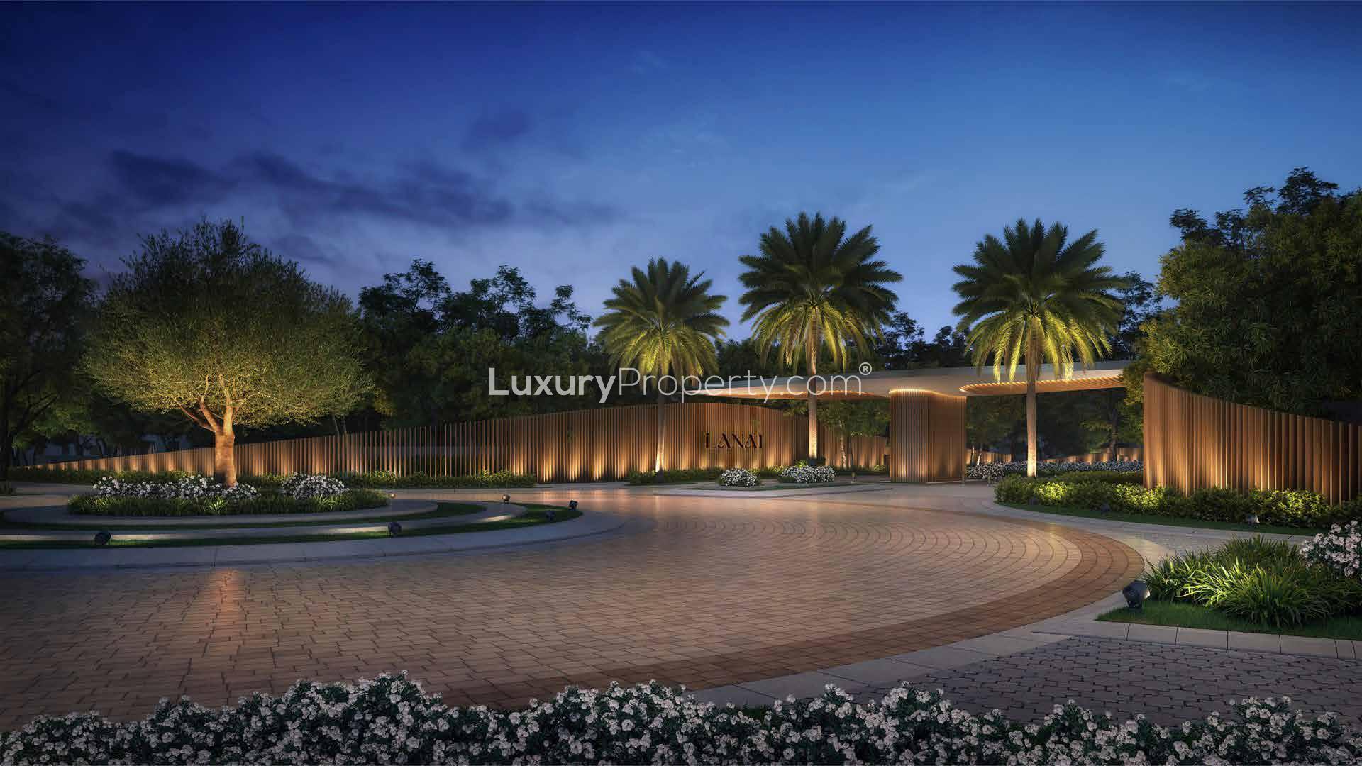 Luxurious villa with illuminated pool at night, Lanai Islands, Tilal Al Ghaf community