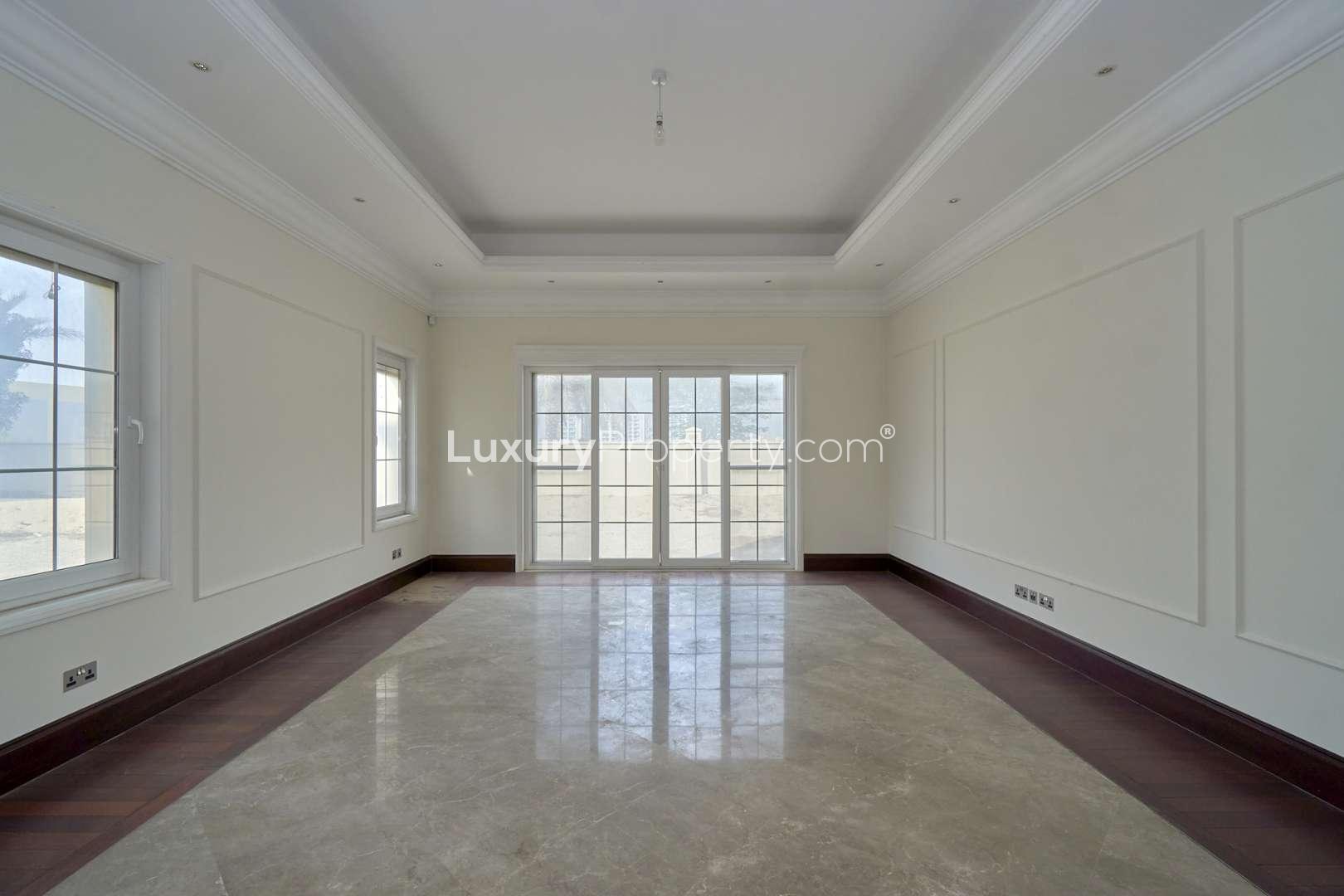 Spacious interior of upgraded villa in Polo Homes, Arabian Ranches, with elegant flooring