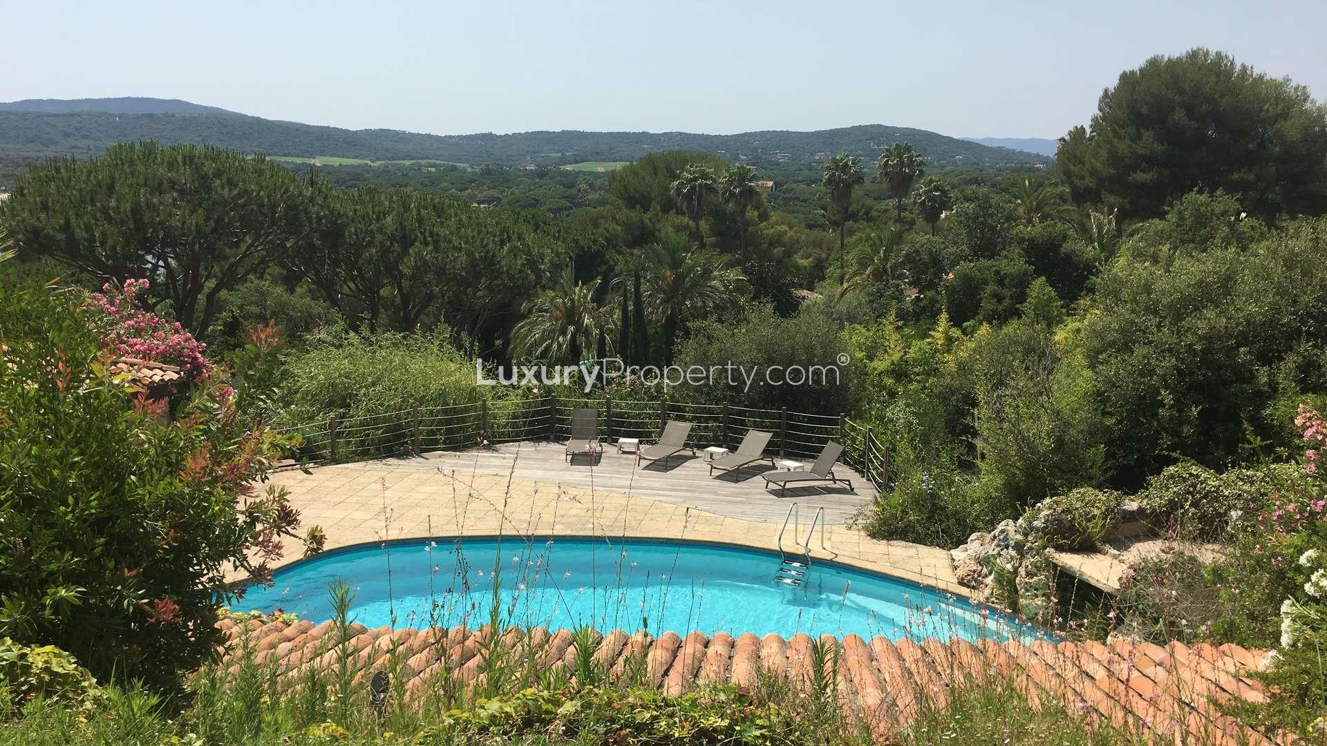 Luxurious St. Tropez villa dining area with stunning sea view, French Riviera