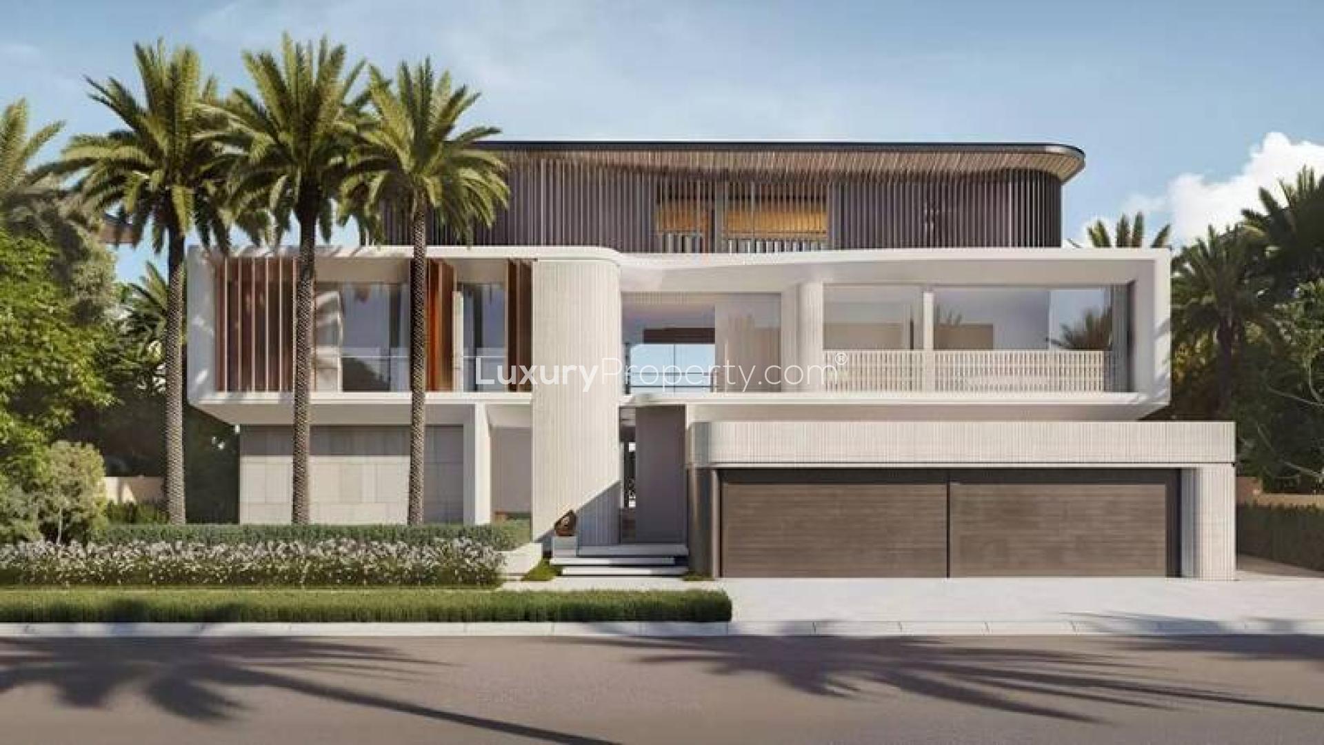 Luxury beachfront villa exterior in Palm Jebel Ali, Frond O, with lush landscaping