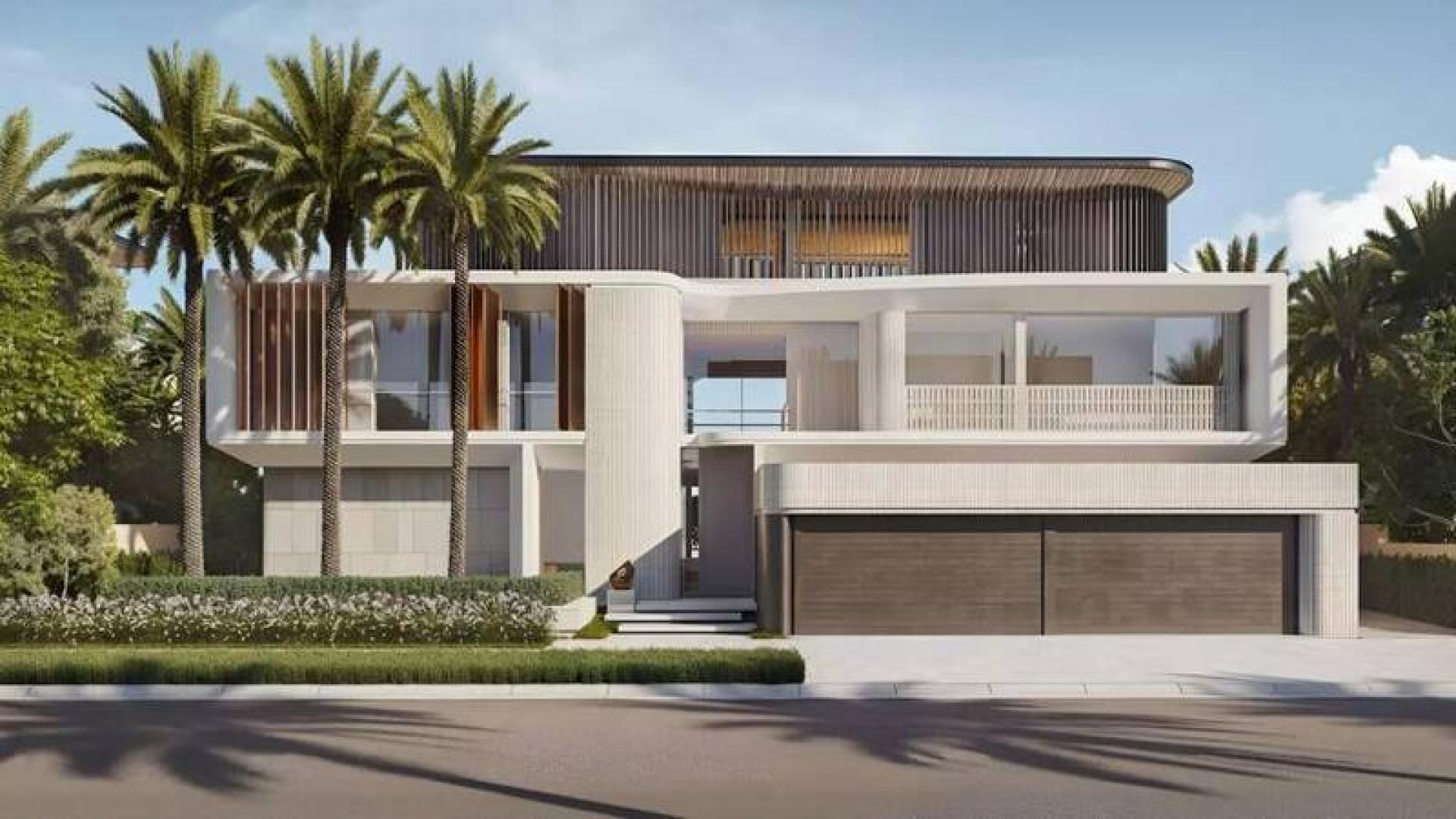 Luxury beachfront villa exterior in Palm Jebel Ali, Frond O, with lush landscaping