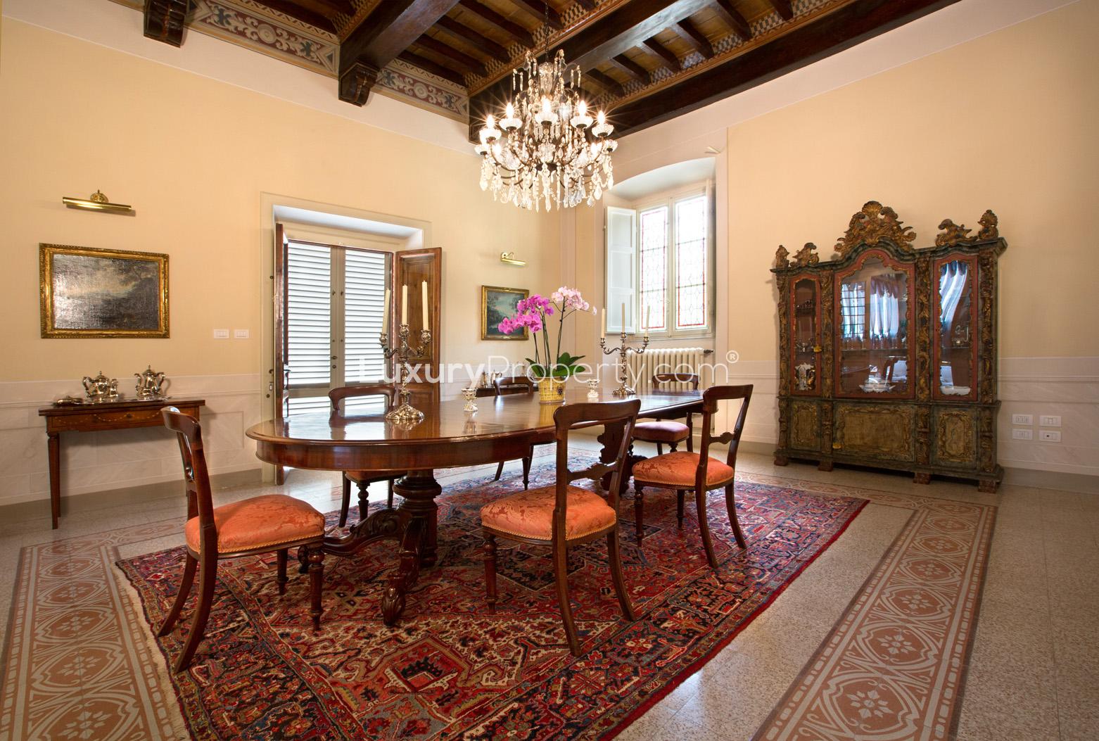 Luxurious billiard room in 18th century Lucca villa with elegant decor and lighting