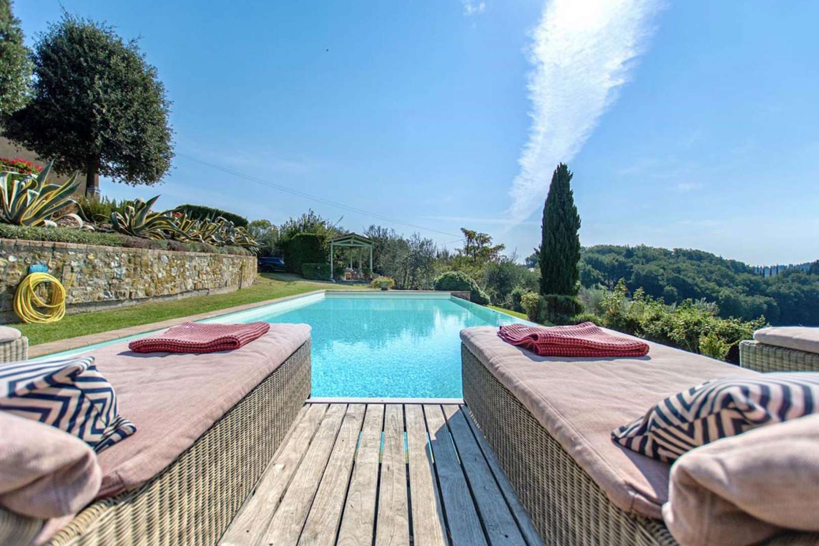 Infinity pool with scenic views at Renovated Rustic Tuscan Villa, Villa Chianti Sunset, Florence