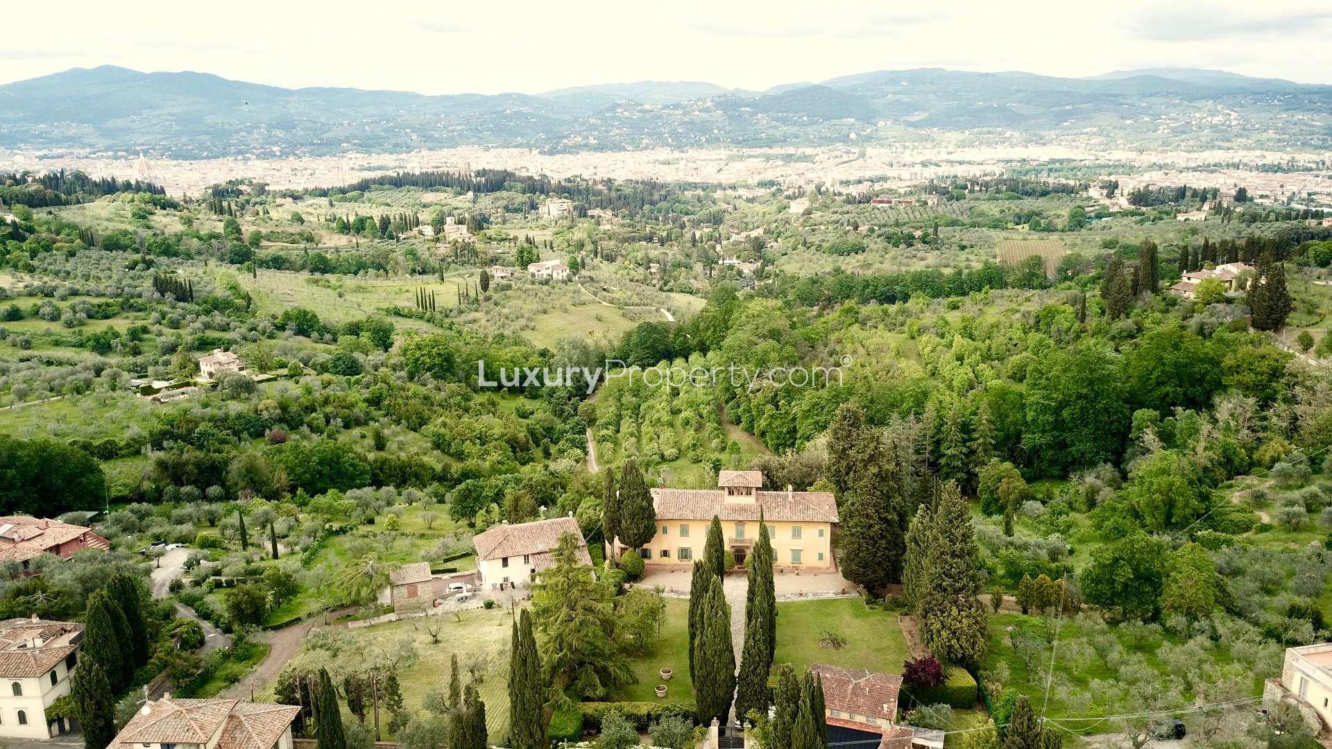 Aerial view of Villa La Costa, Florence, surrounded by lush greenery and scenic hills
