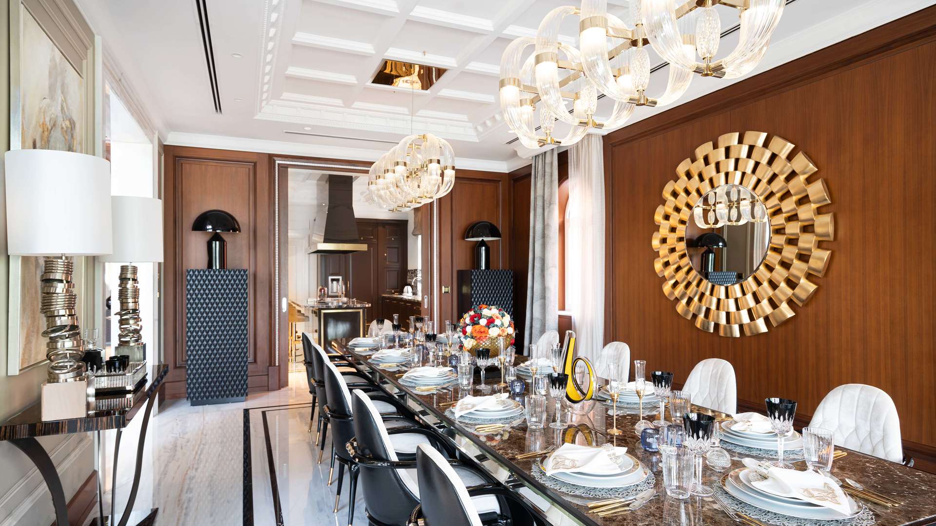 Luxurious living room in XXII Carat villa, Palm Jumeirah, with elegant decor and chandelier