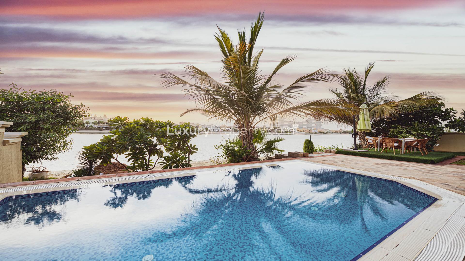 Stunning beachfront villa with lush garden on Palm Jumeirah, perfect for luxury living