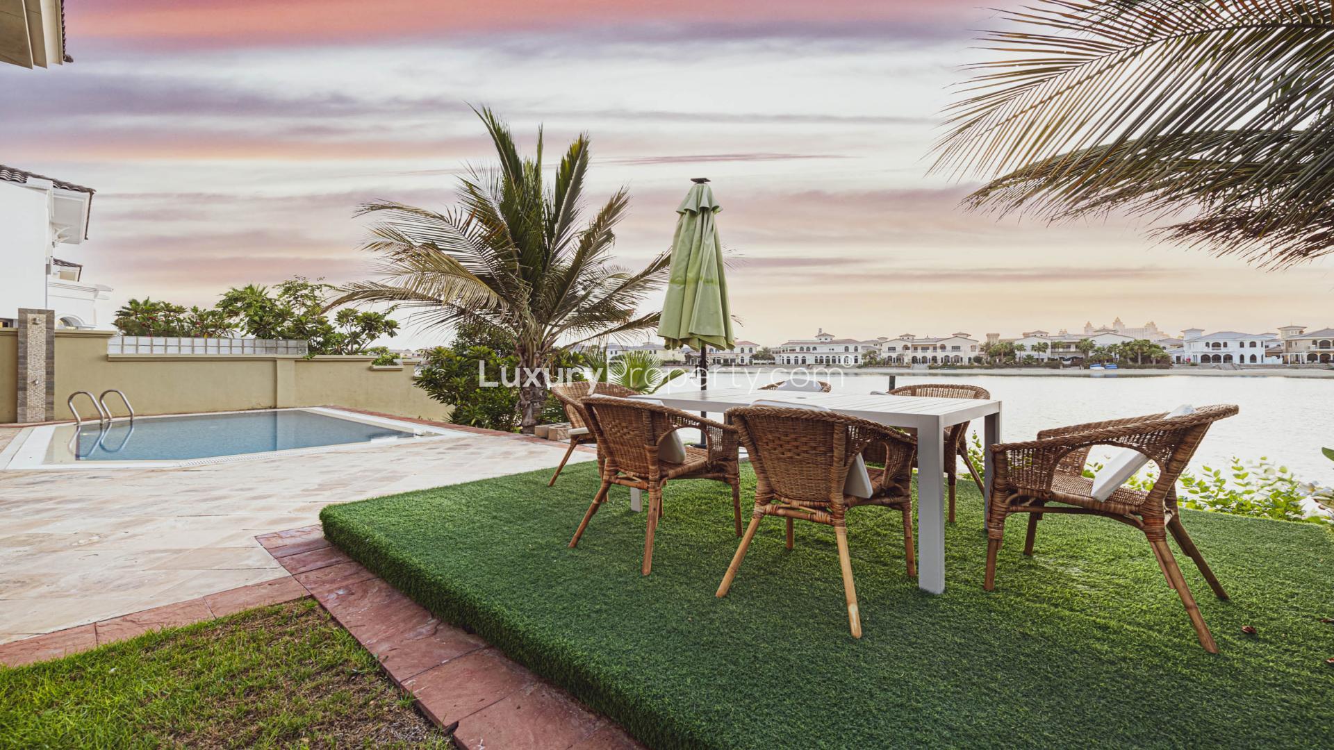Luxurious living room in Villa Exotica, Palm Jumeirah, featuring elegant decor and spacious layout