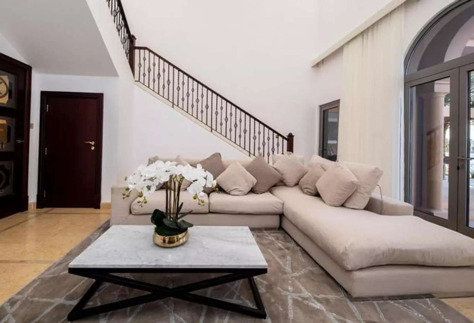 Furnished living room in Signature Villa, Palm Jumeirah with modern decor and natural light