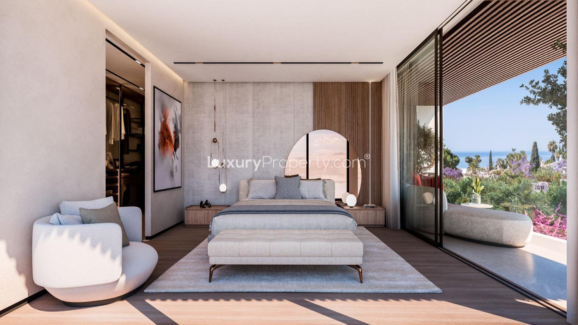 Luxurious living room in Marbella villa with pool view, modern decor, spacious seating area