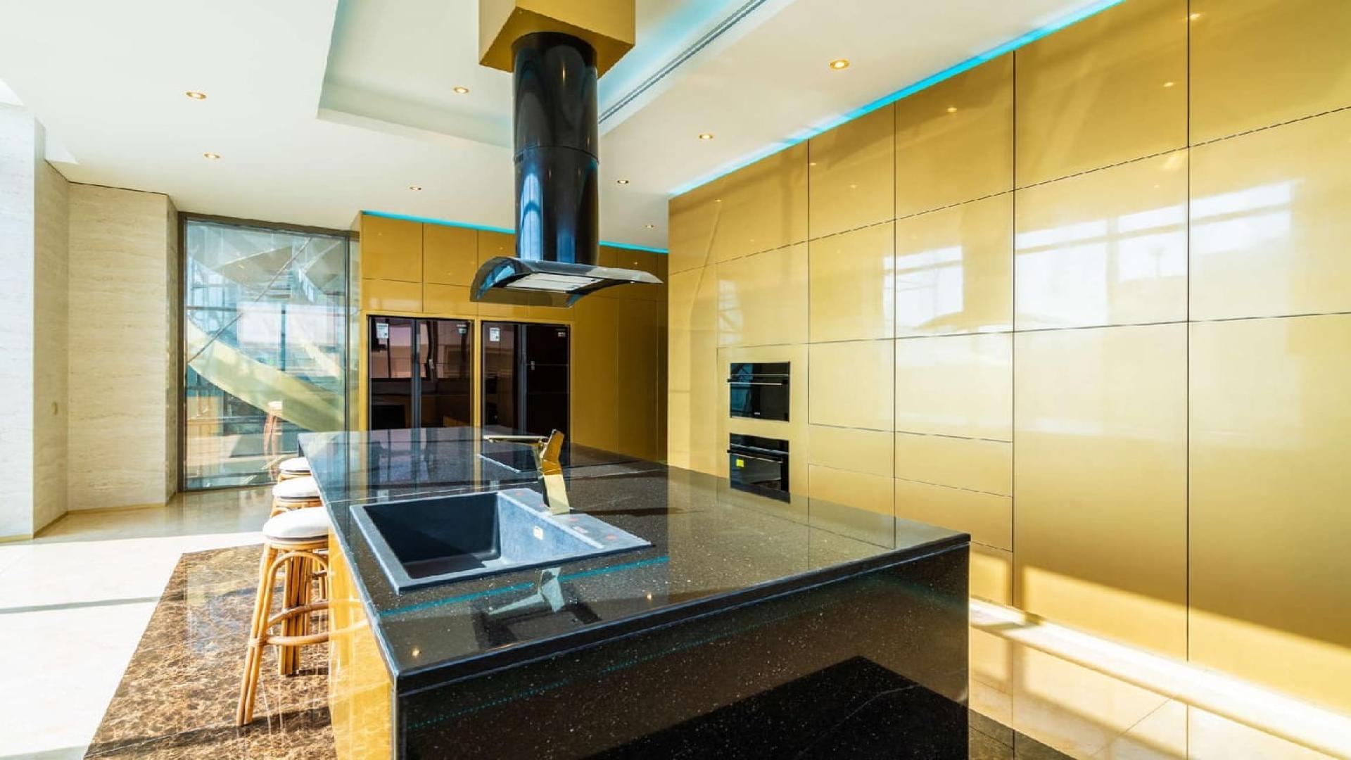 Luxurious 8-bedroom villa exterior in Pearl Jumeirah with modern architecture and elegant design