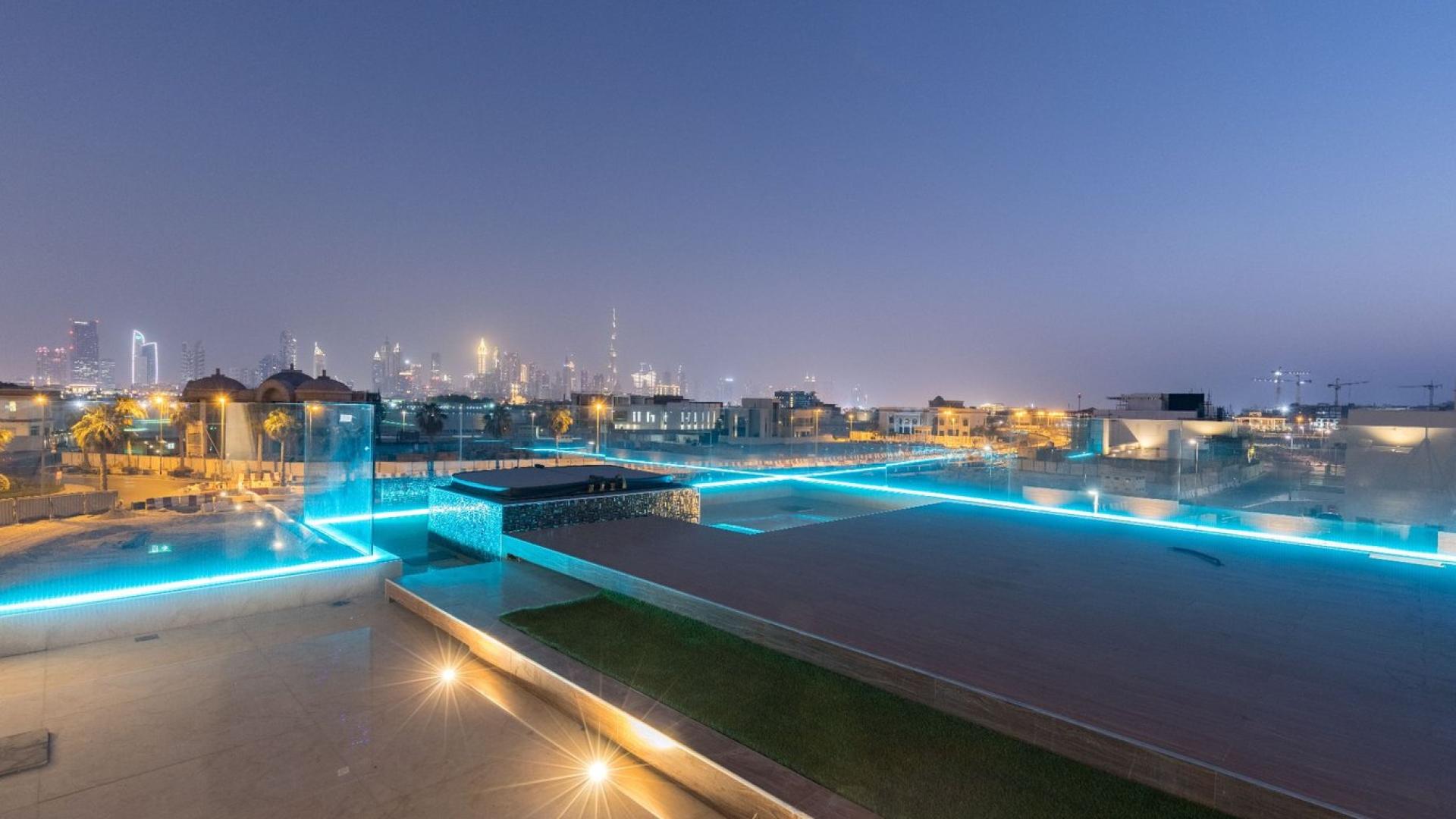 Luxurious interior of Pearl Jumeirah villa with modern staircase and ambient lighting