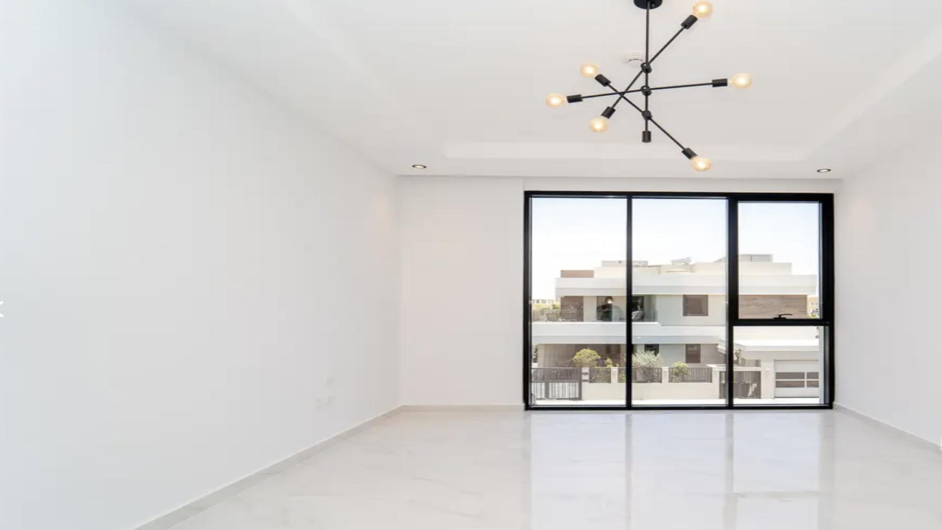 Modern bathroom in 8-bedroom villa, Jumeirah Islands, featuring sleek design and spacious shower