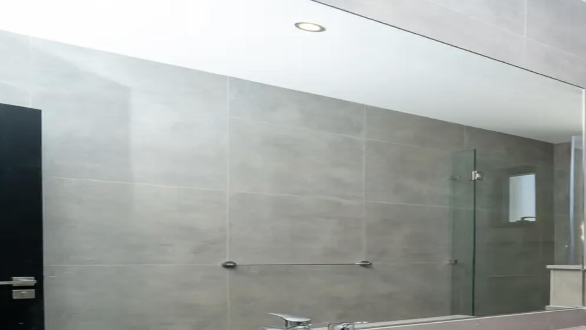 Modern staircase and elevator in luxury 8-bedroom villa, The Mansions, Jumeirah Islands