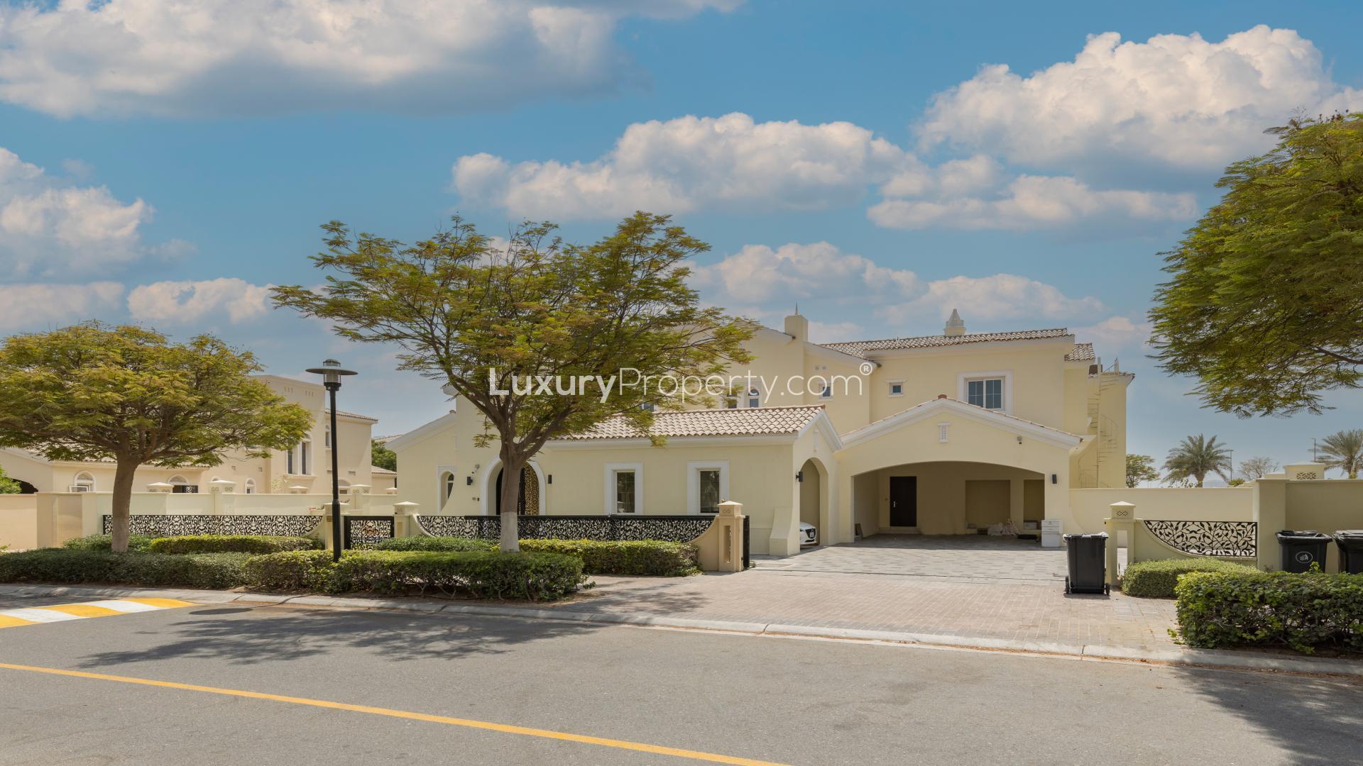 Luxurious 8-bed villa exterior with spacious lawn in Polo Homes, Arabian Ranches