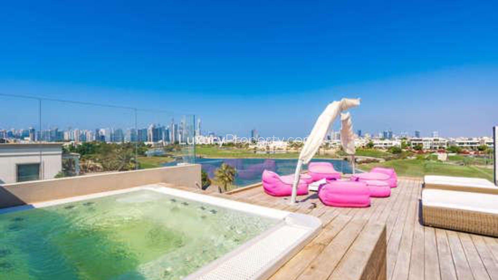 Rooftop terrace of 8-bedroom villa in Emirates Hills, featuring modern outdoor seating