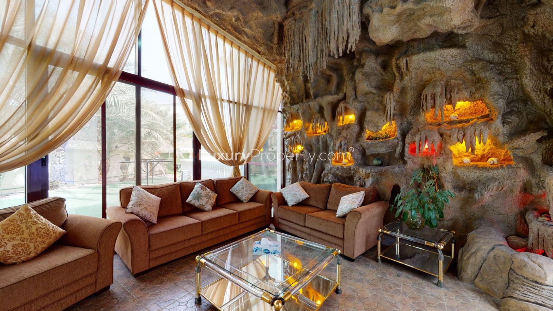 Elegant staircase in luxurious 8-bedroom villa, Emirates Hills Sector E, spacious interior design