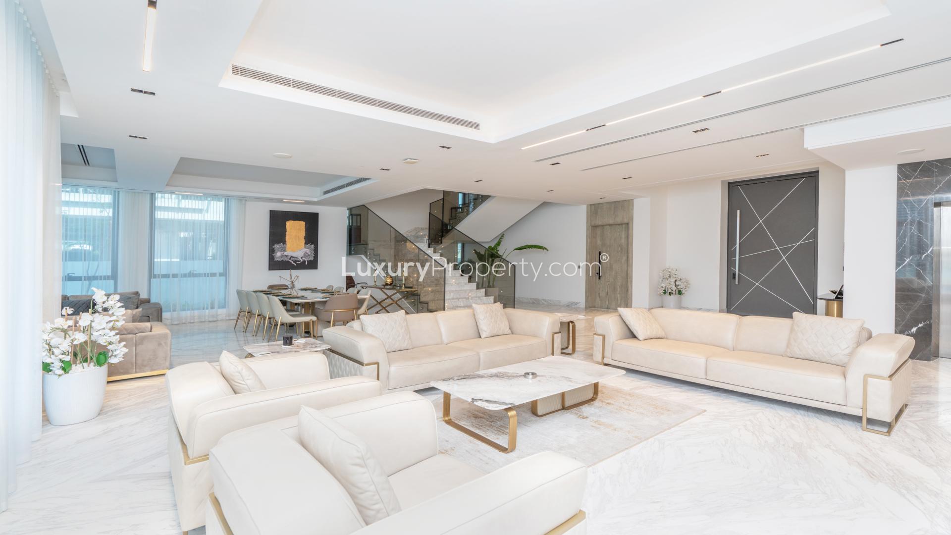 Luxurious poolside view at 8-bedroom villa in Palm Jumeirah’s Signature Villas, Dubai