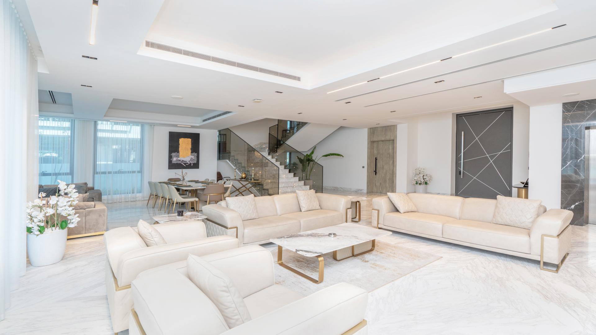 Luxurious poolside view at 8-bedroom villa in Palm Jumeirah’s Signature Villas, Dubai