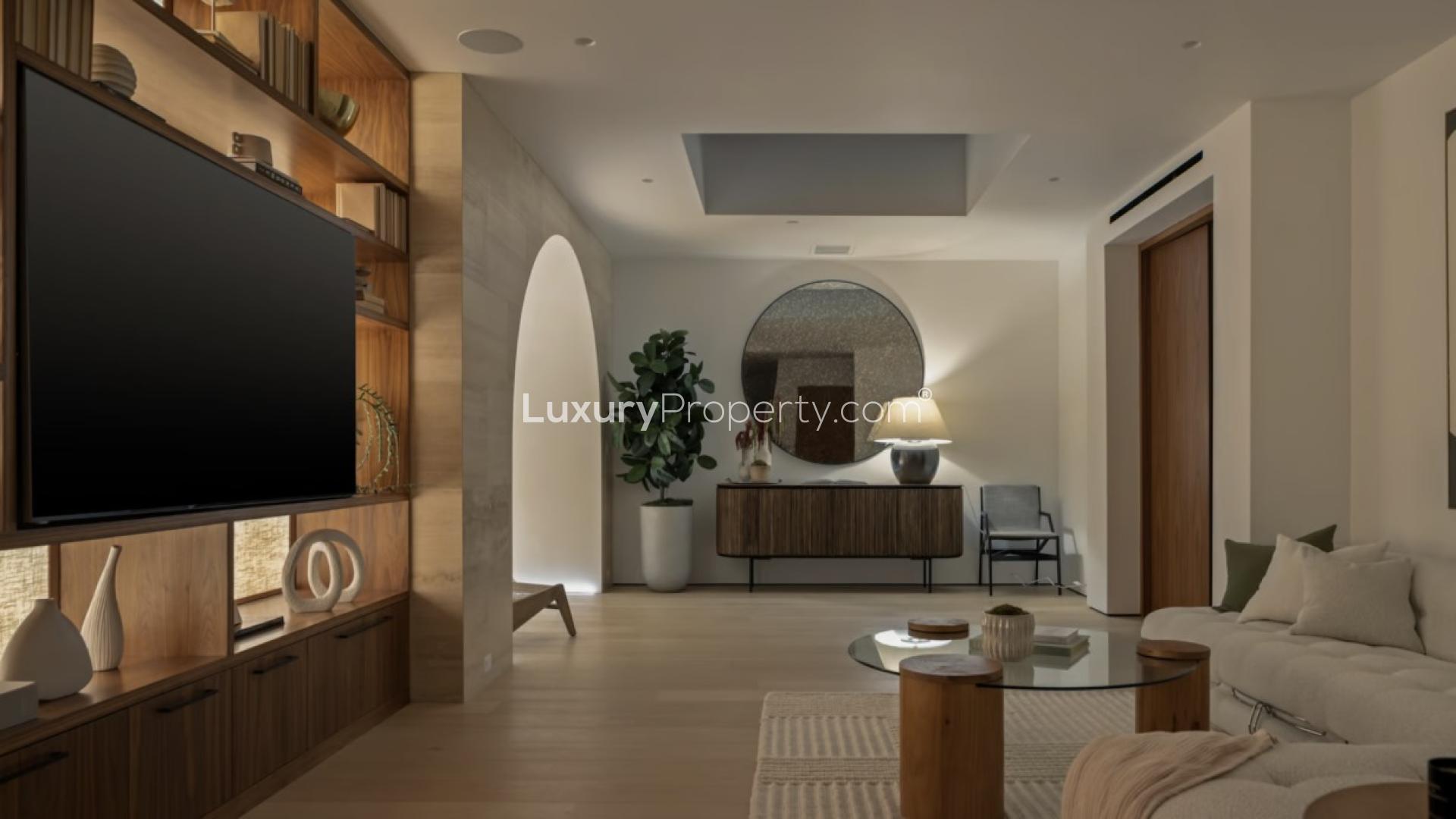 Luxurious modern bar area in Los Angeles villa, featuring elegant seating and ambient lighting