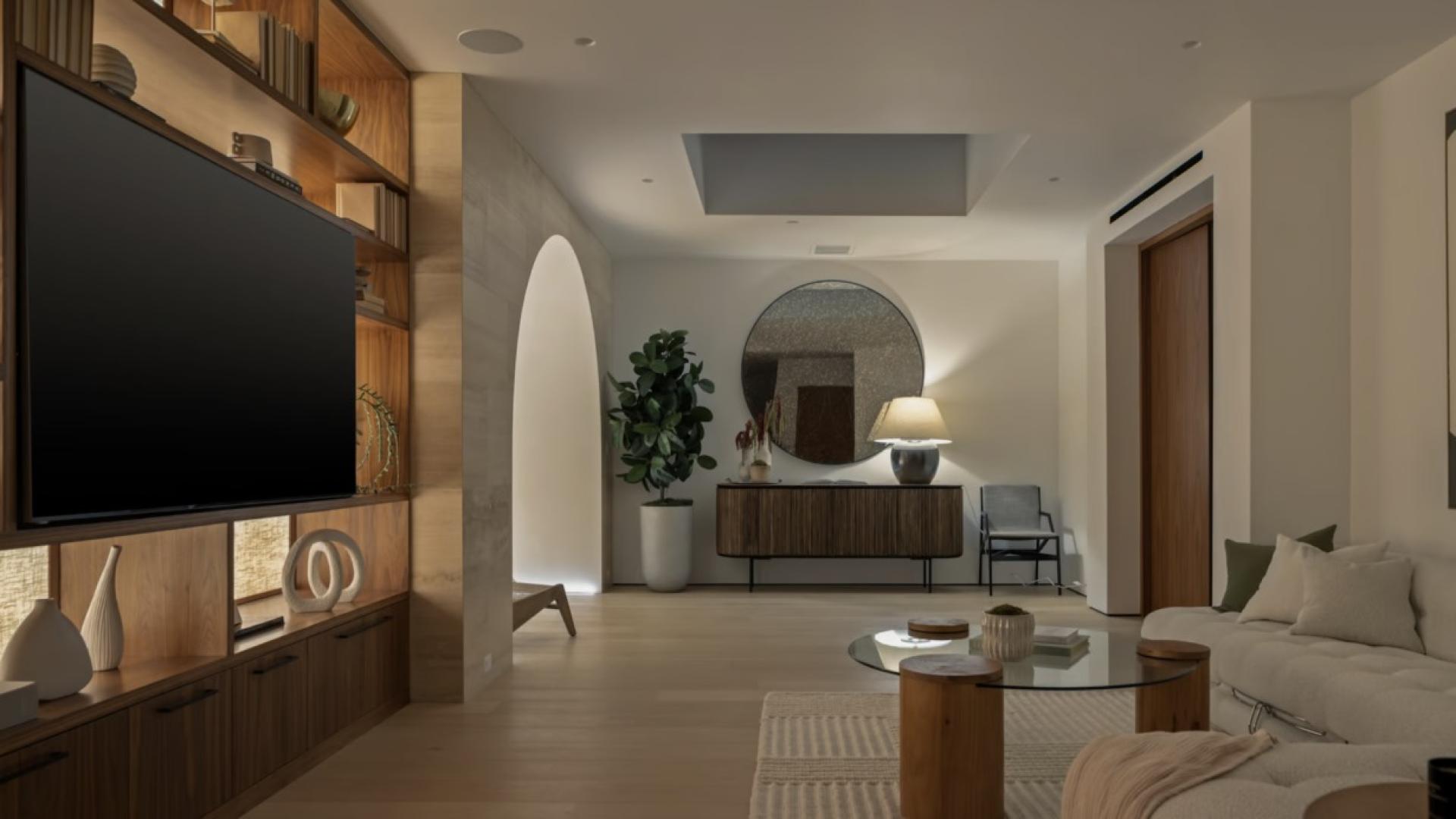 Luxurious modern bar area in Los Angeles villa, featuring elegant seating and ambient lighting