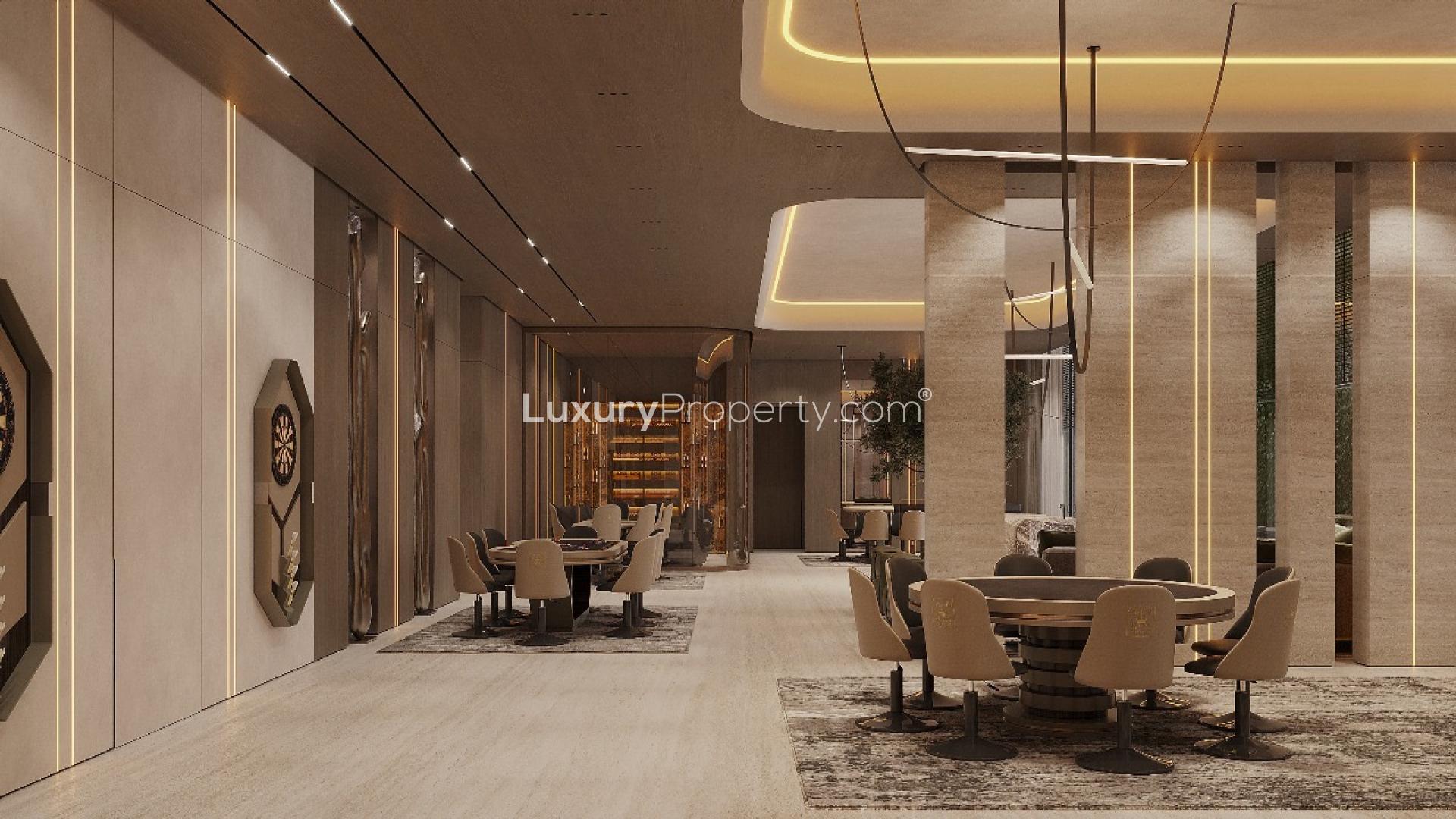 Luxurious living room in Emirates Hills villa with modern decor and ambient lighting