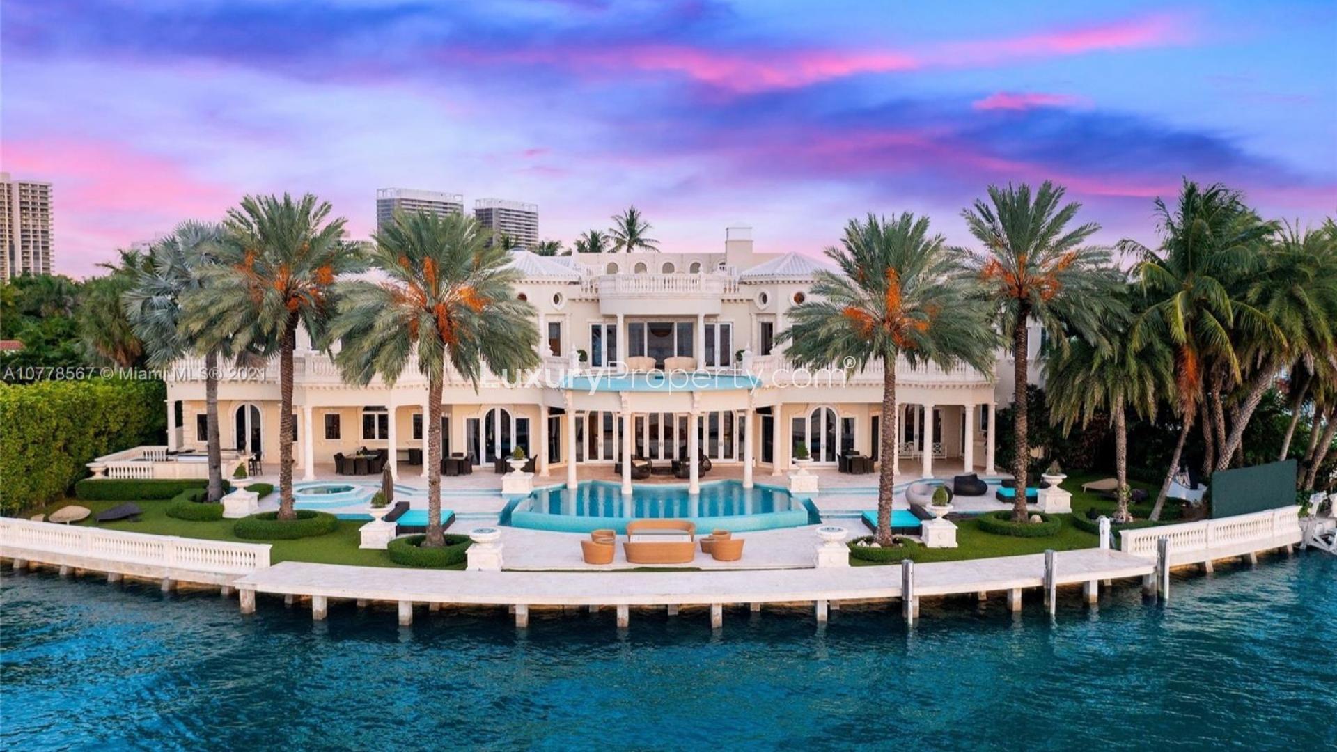 Luxurious 8-bedroom waterfront villa for sale in Bal Harbour, Miami, with stunning sunset views