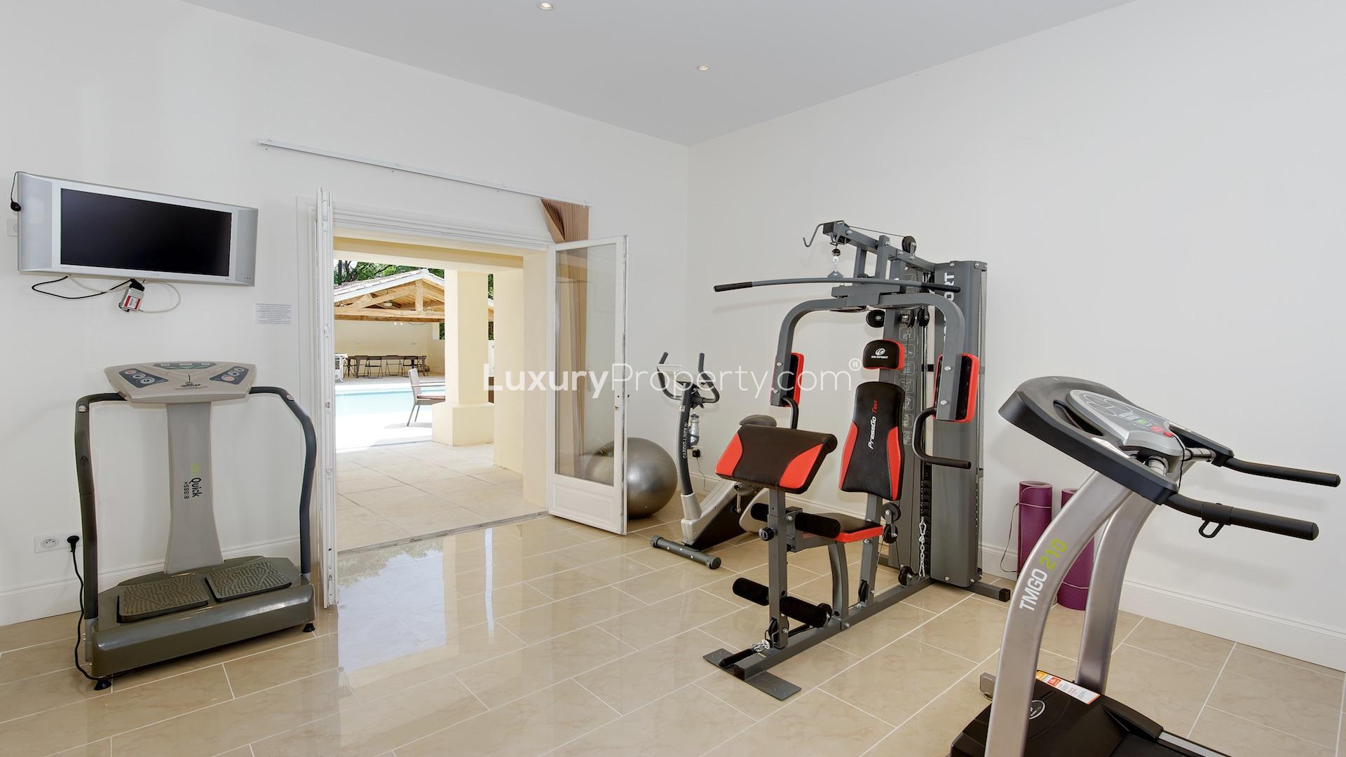 Modern kitchen in luxury villa, Central Cannes, with sleek countertops and large windows