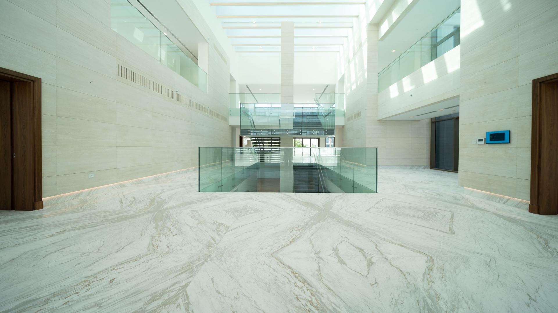 Contemporary lagoon-facing villa exterior in District One, Mohammed Bin Rashid City, for sale