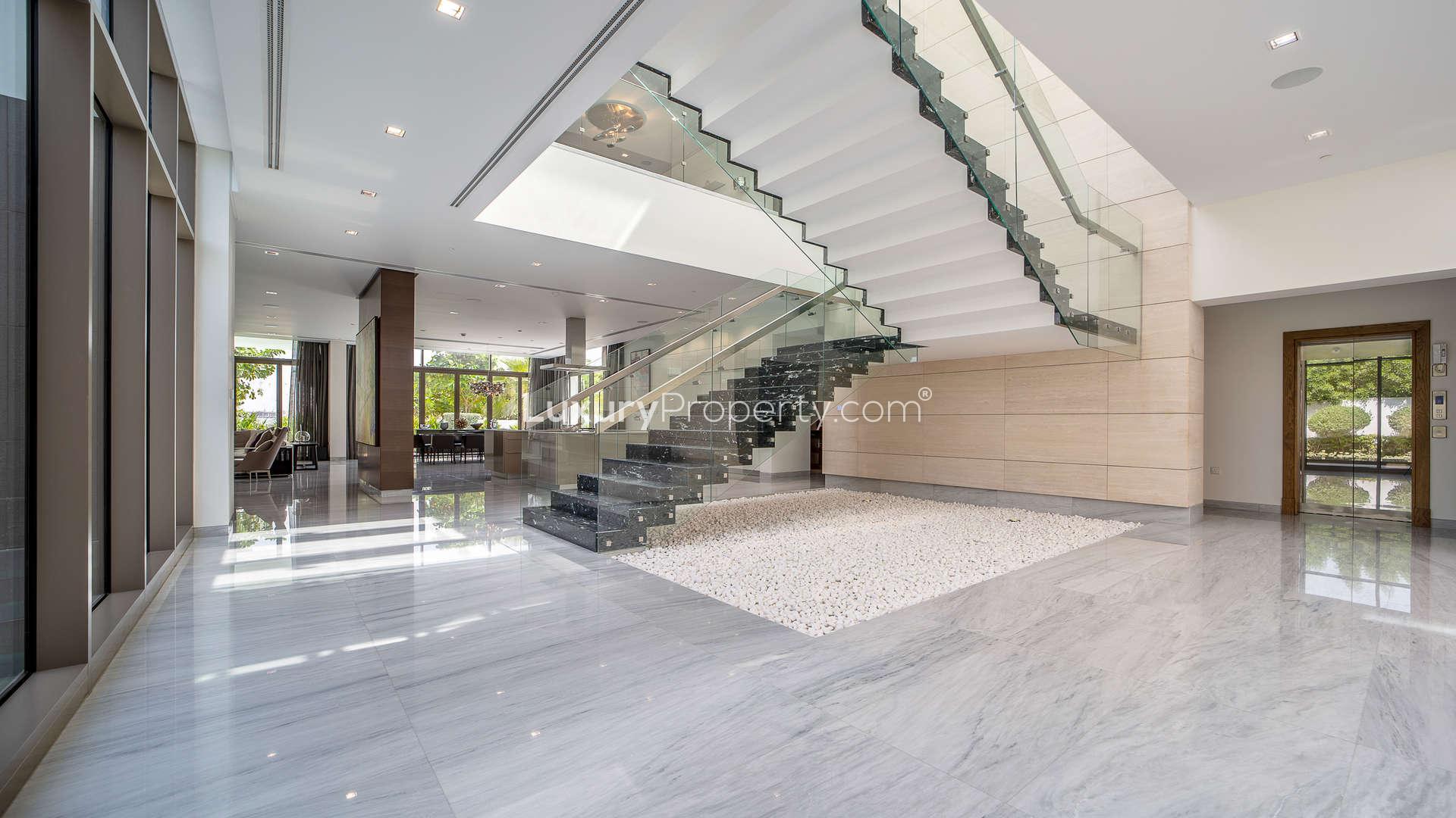 Luxurious contemporary mansion bathroom with freestanding tub in District One, MBR City