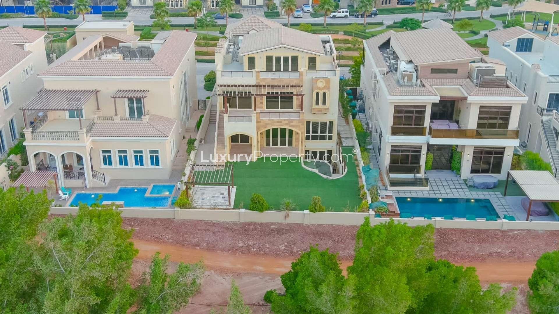 Stunning 8-bedroom villa with lush lawn in Jumeirah Golf Estates, Earth community