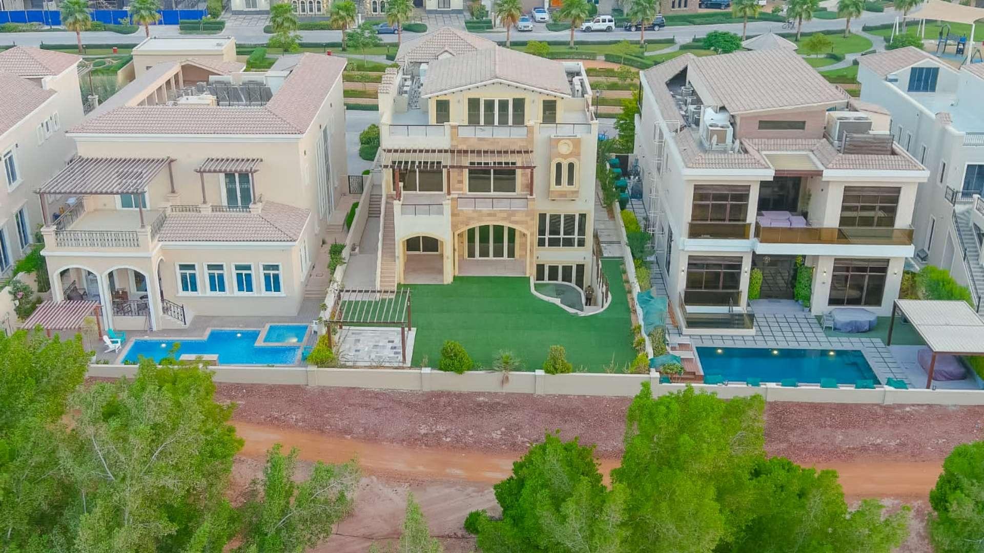 Stunning 8-bedroom villa with lush lawn in Jumeirah Golf Estates, Earth community