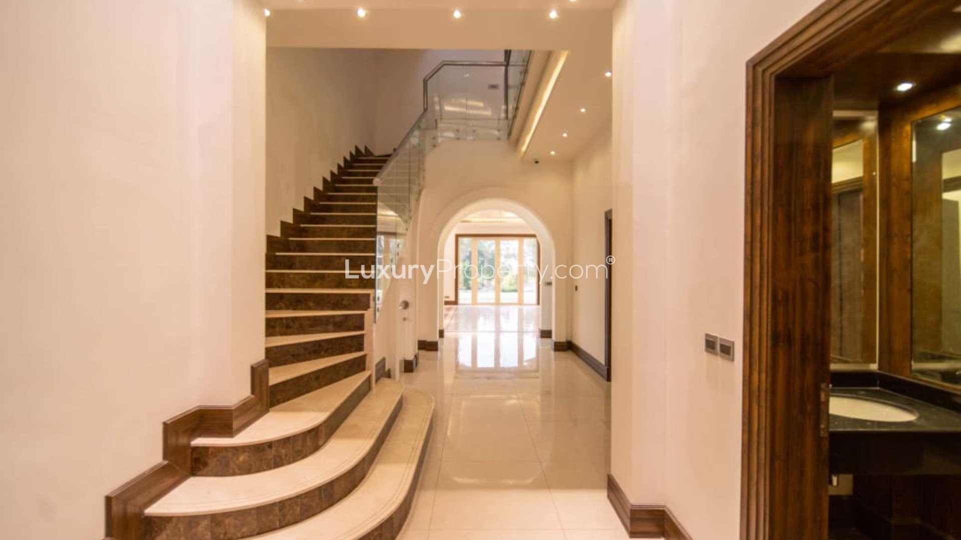 Aerial view of custom villa in Jumeirah Golf Estates, overlooking Earth Golf Course