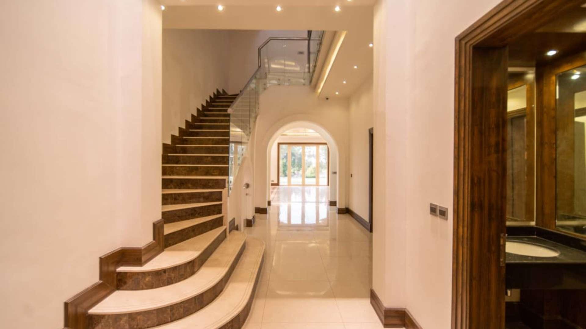 Aerial view of custom villa in Jumeirah Golf Estates, overlooking Earth Golf Course