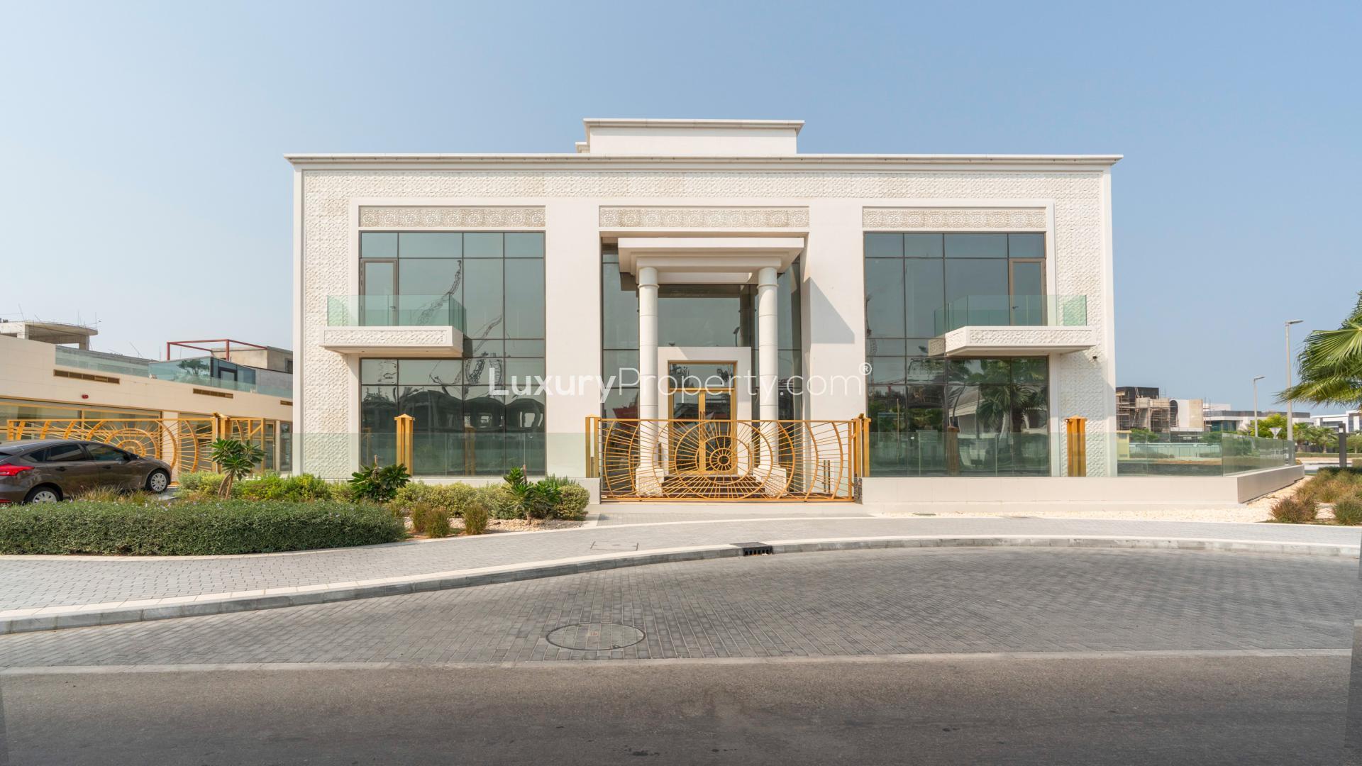 Luxurious Pearl Jumeirah villa exterior with palm trees, modern architecture, and spacious driveway