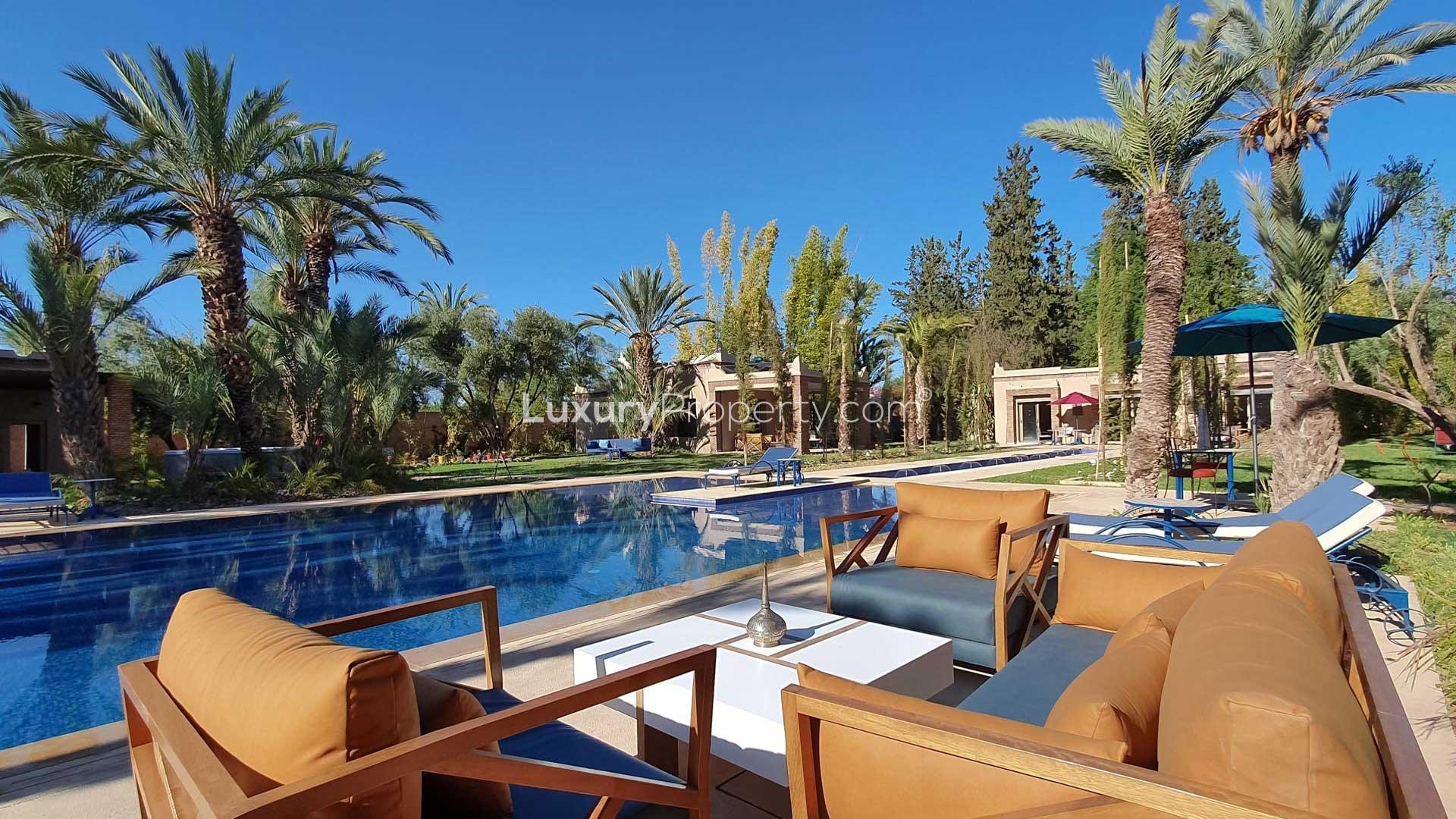 Luxurious Villa Zendaya in Marrakech with pool, palm trees, and modern architecture